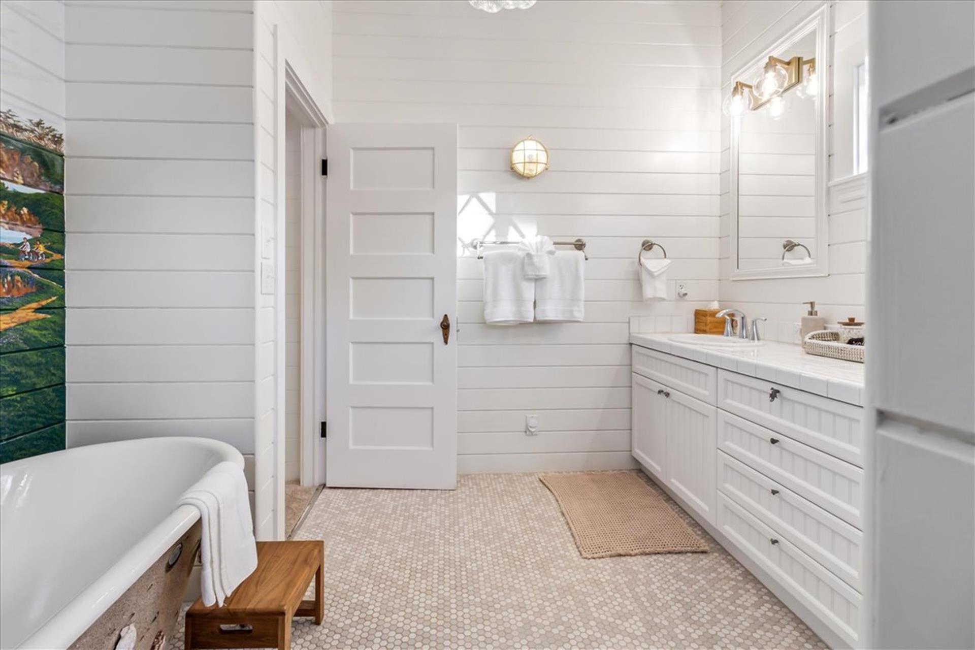Full Bath has a Shower and Separate Vintage Bathtub