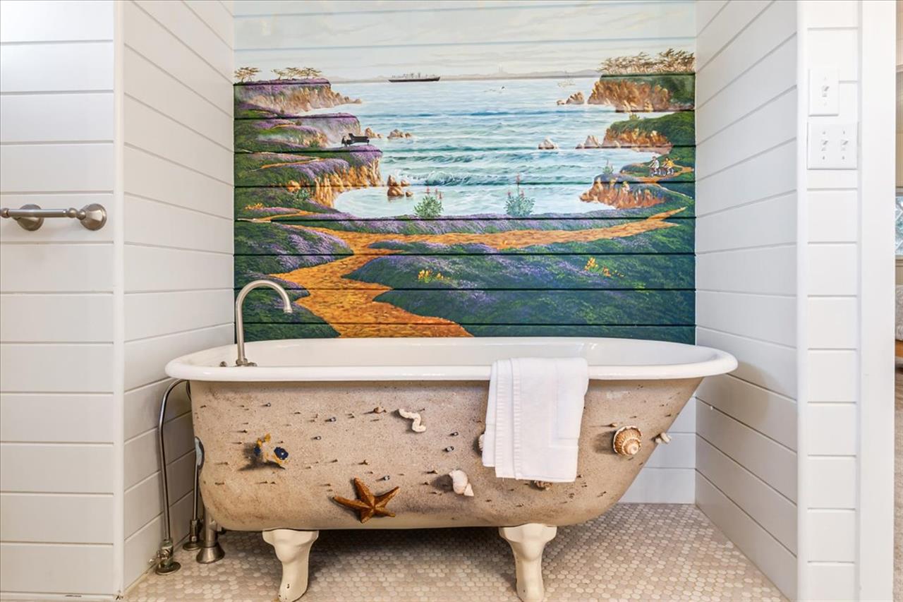 Vintage, Artisanal Bath Tub has a Beautiful Mural