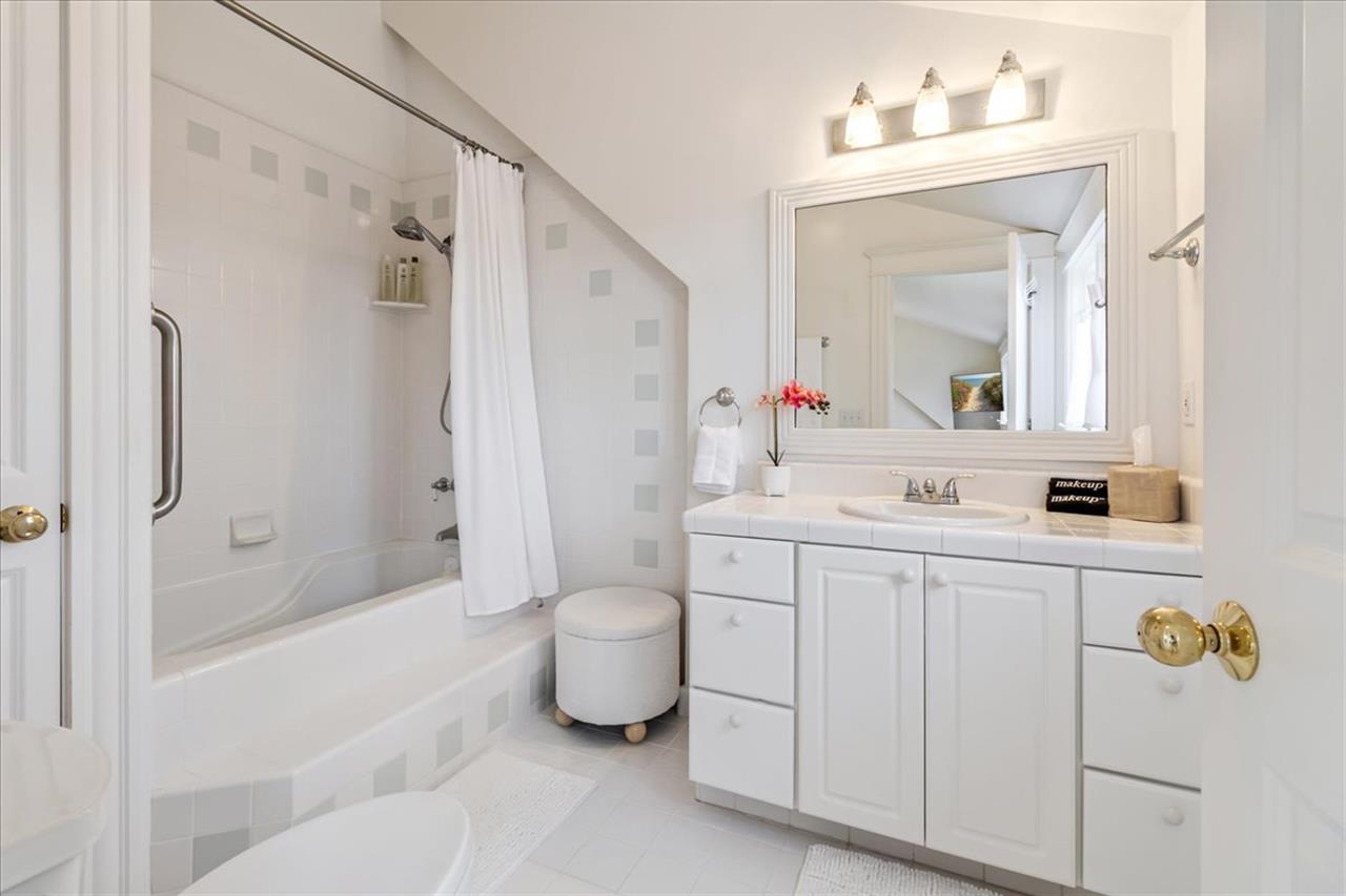 EnSuite Bathroom with a ShowerOverJacuzzi Tub
