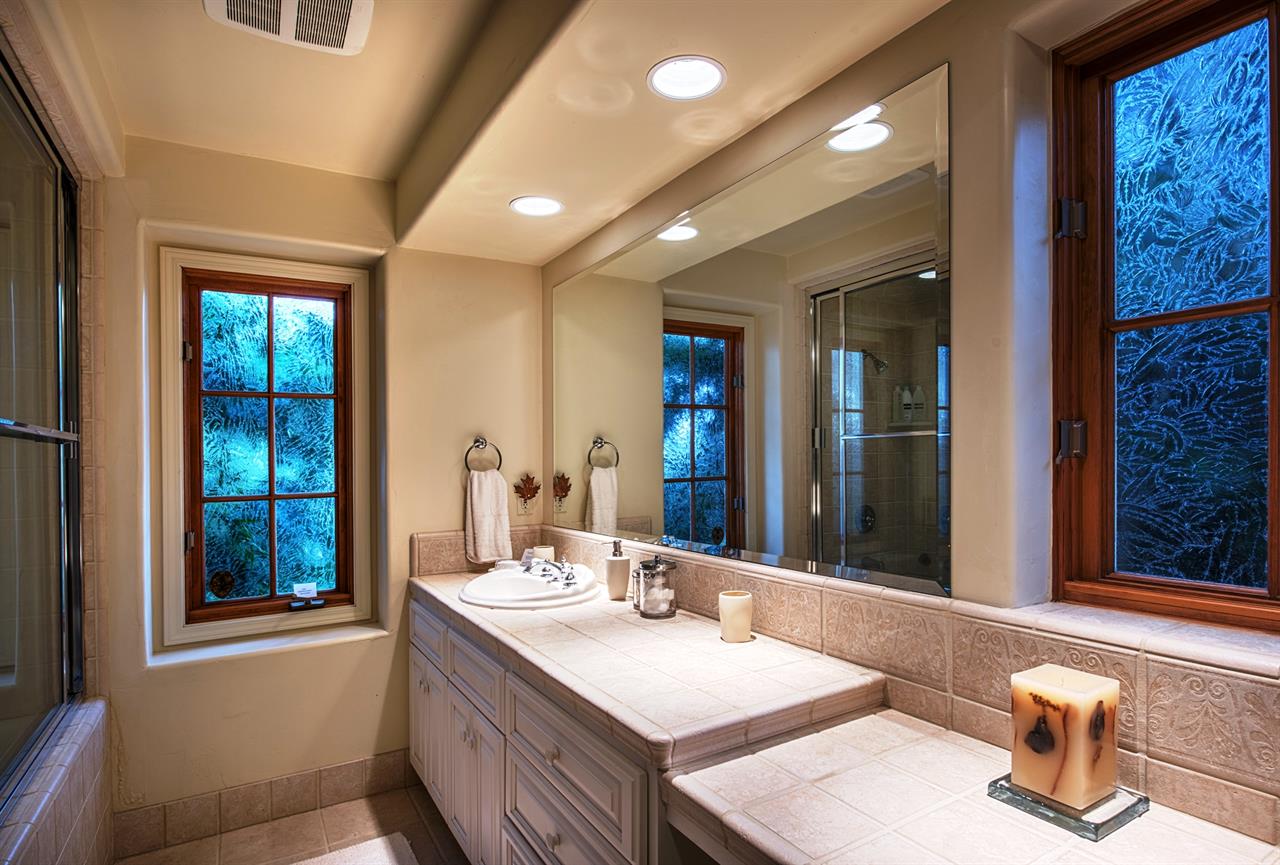 Jack and Jill Style Bath with Steam Shower Over a Bathtub