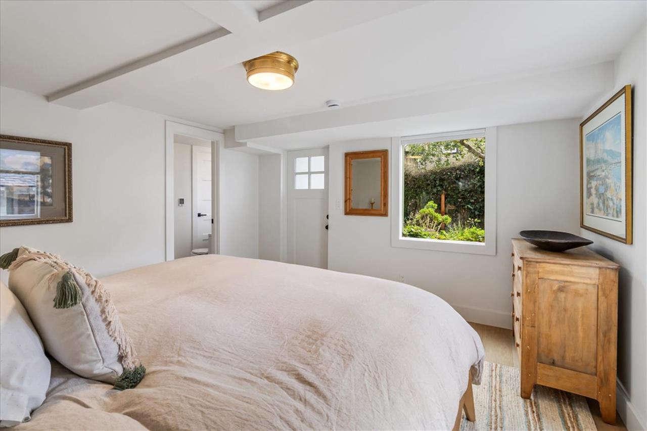 Downstairs Bedroom 1 has a King Bed