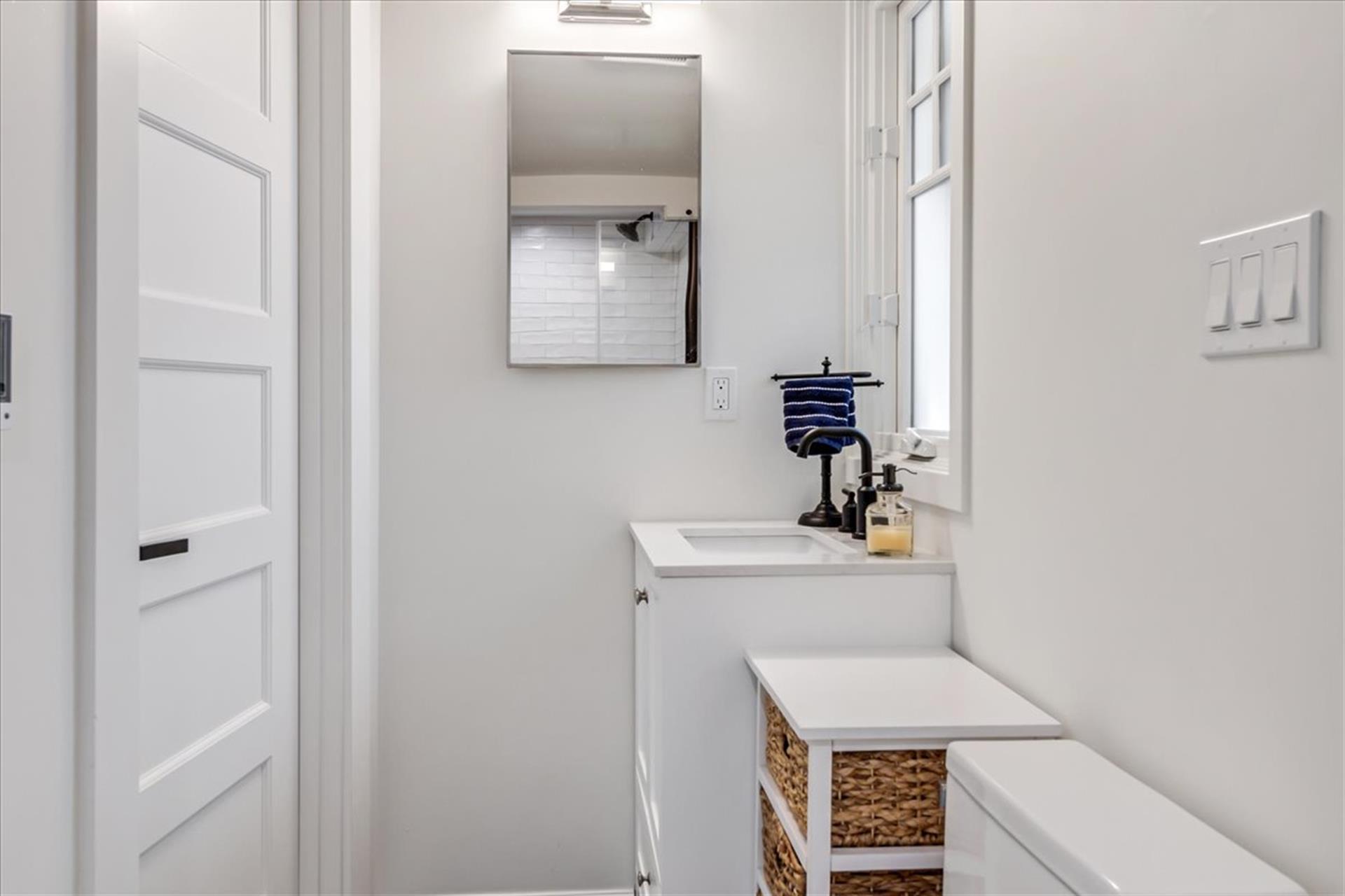Downstairs Bath for Bedrooms 1  2 has a Shower