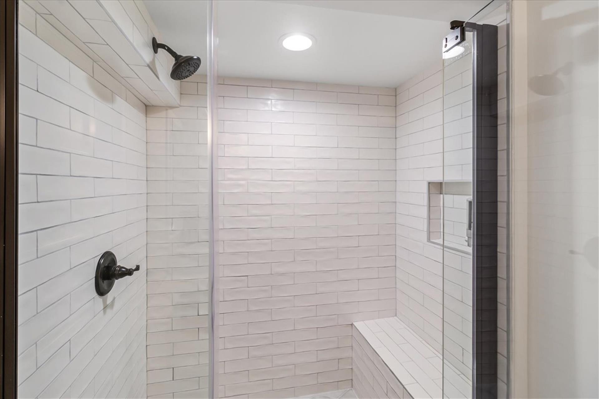 Downstairs Bath for Bedrooms 1  2 has a Shower