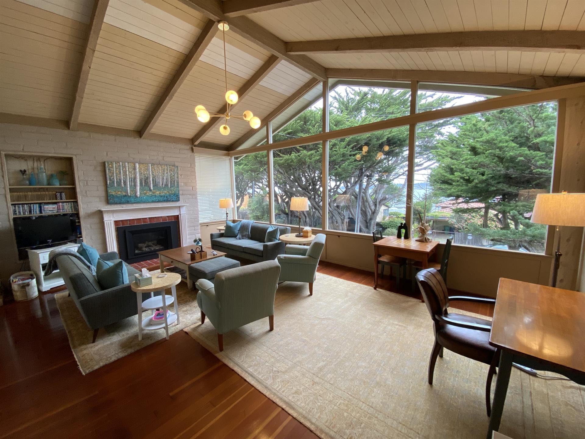 Living Room with Gas Fireplace, TV, Game Table and Desk