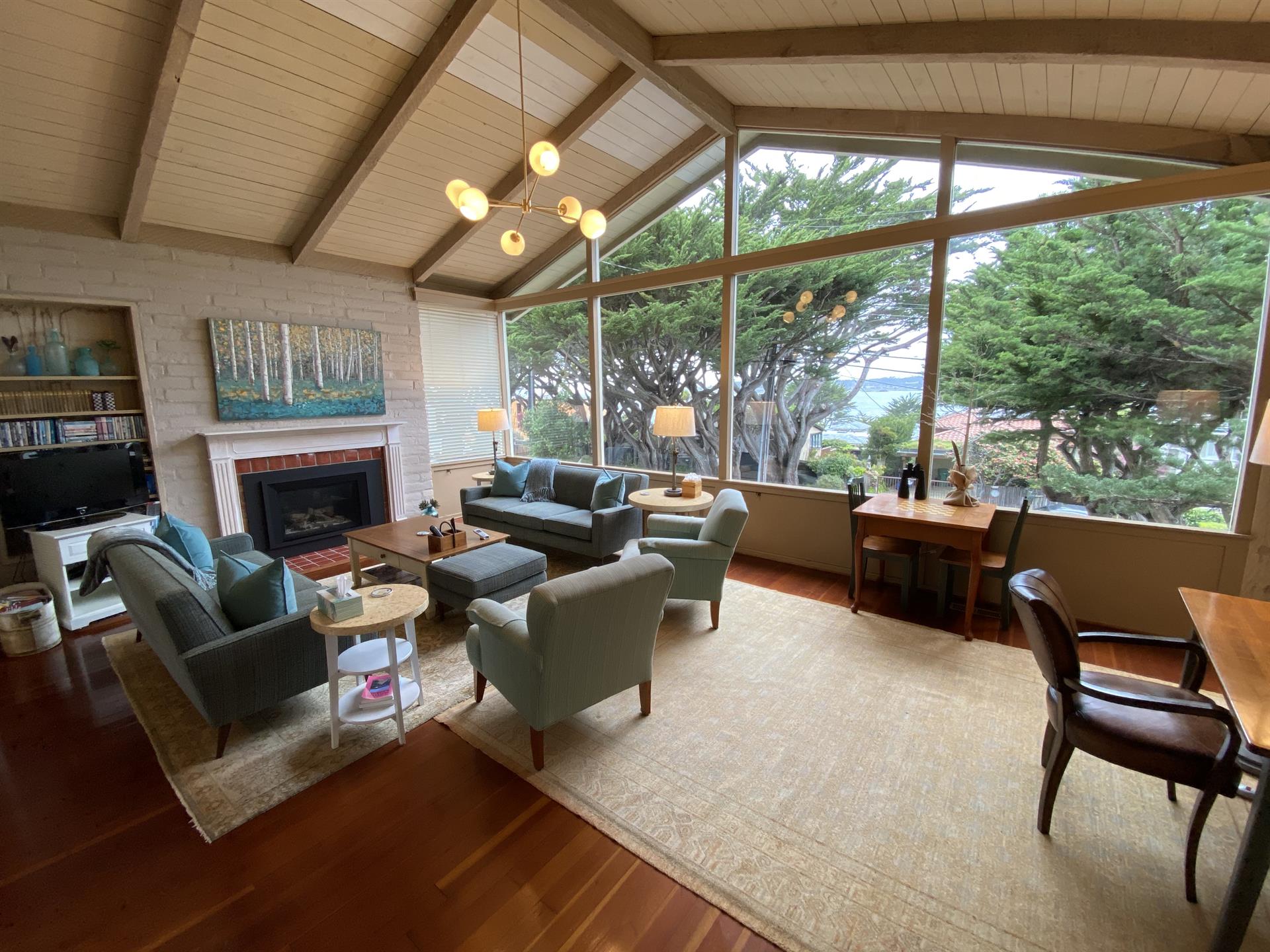 Living Room with Gas Fireplace, TV, Distant Ocean View