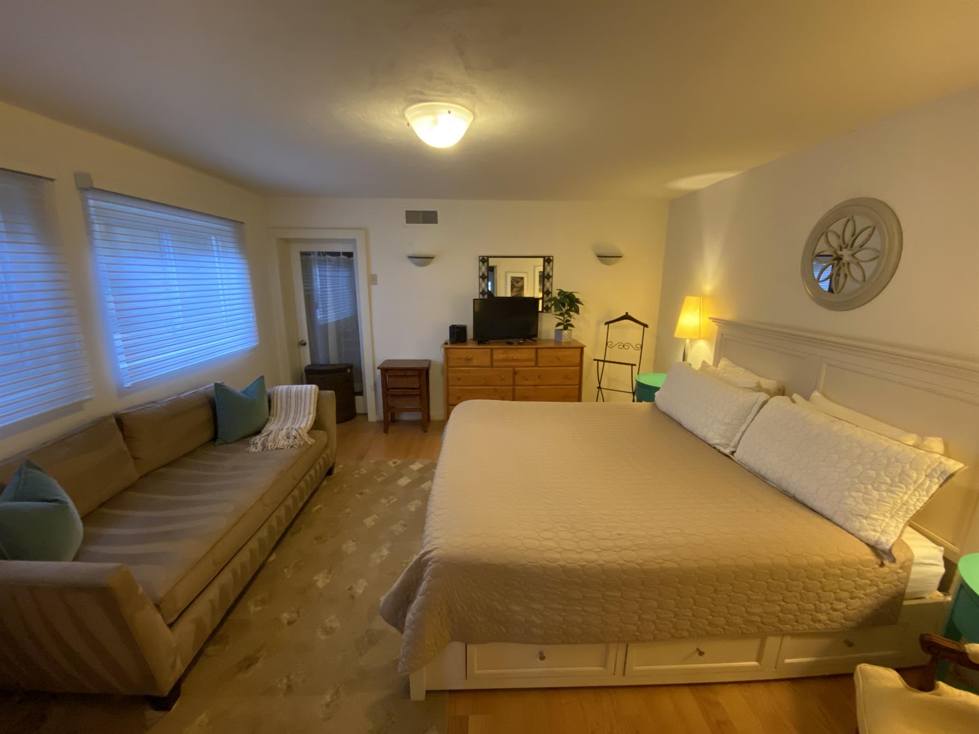 Bedroom 2  King Bed, TV and Sofa