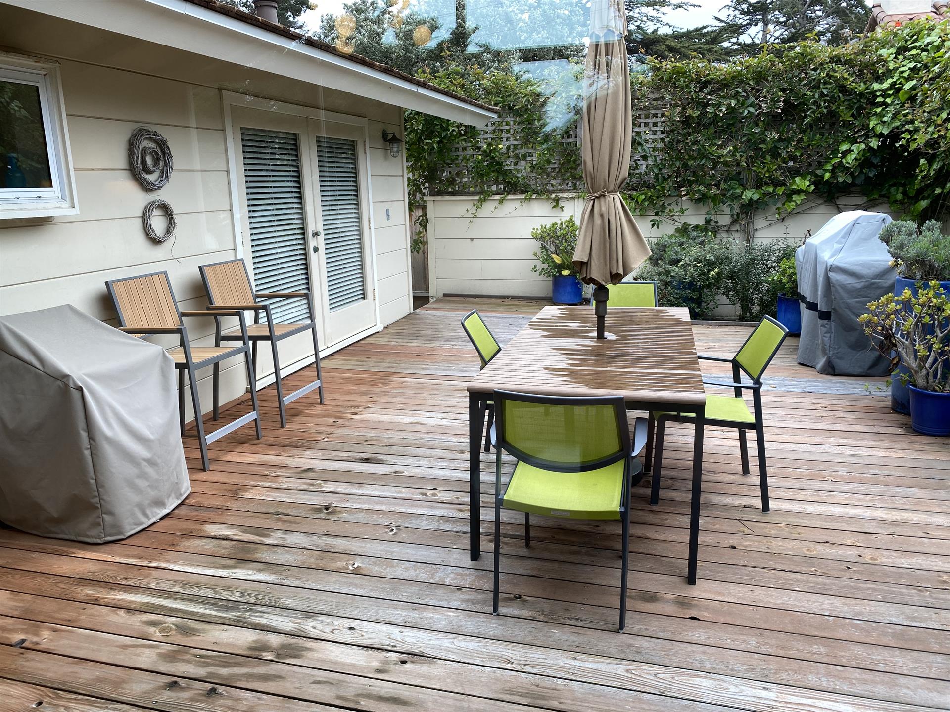 Protected Back Patio has a Gas BBQ Grill