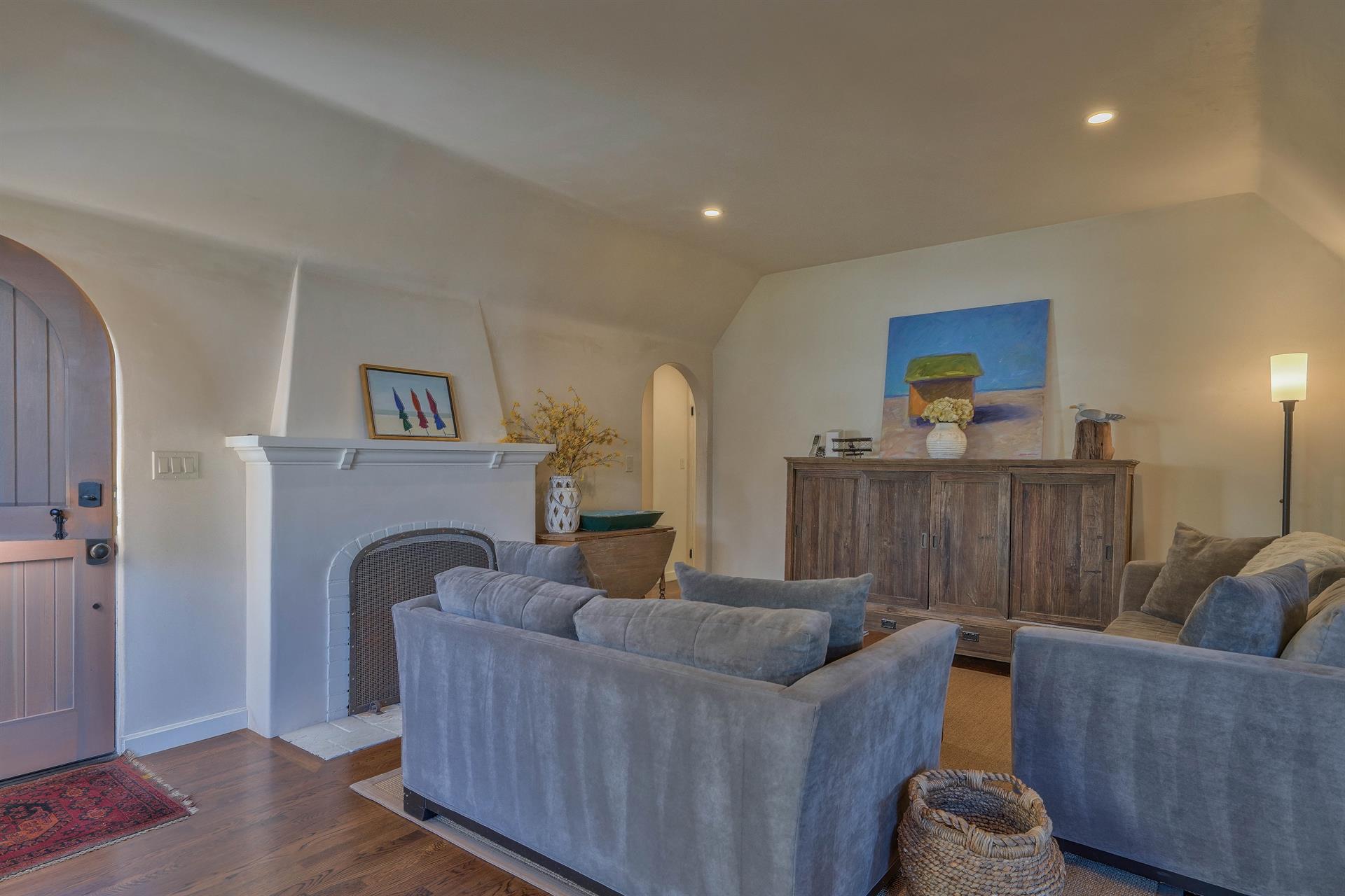 Living Room has a gas log fireplace, TV, and BlueRay DVD