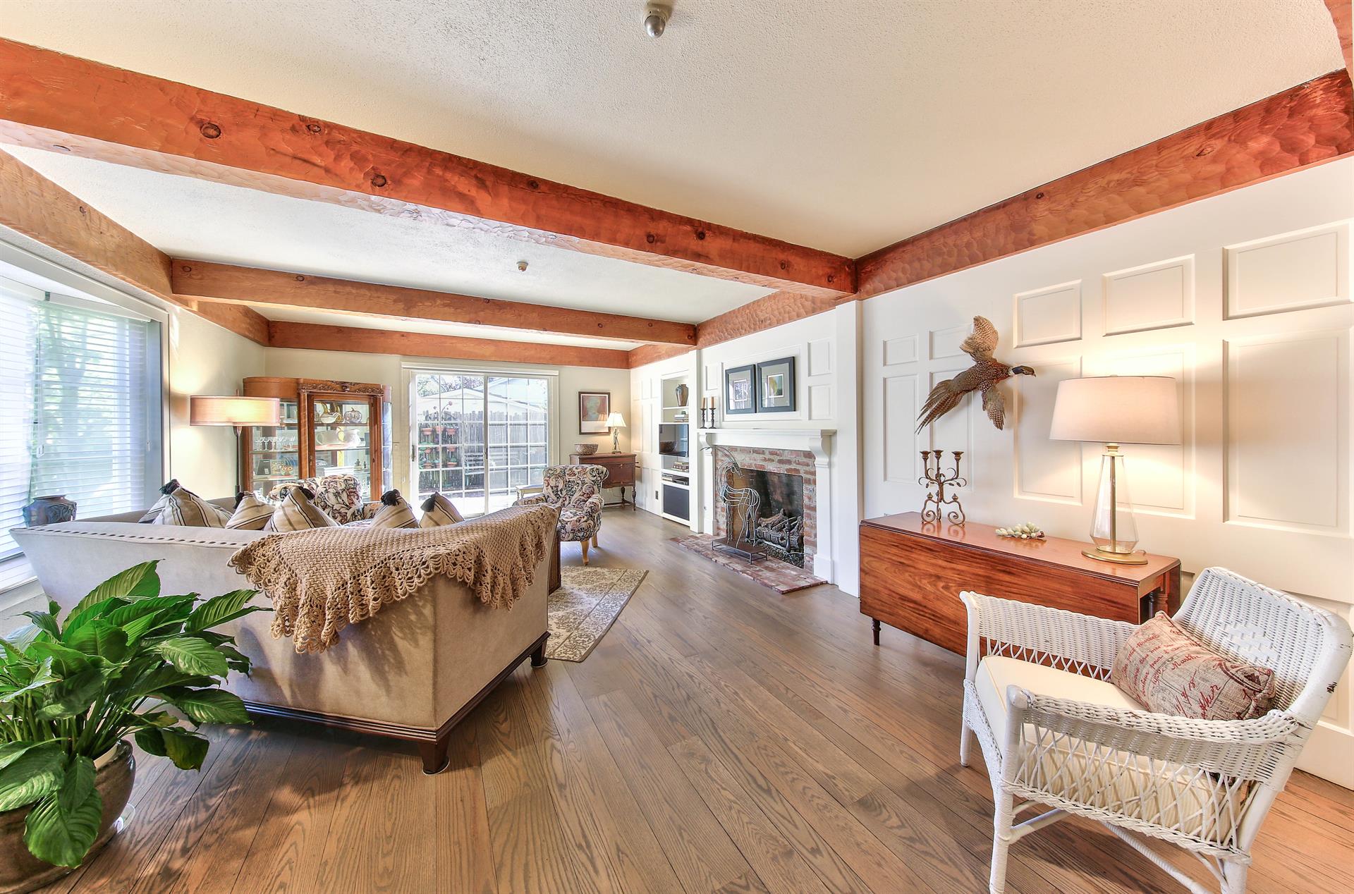 Living Room has a Gas Log Fireplace and Direct TV