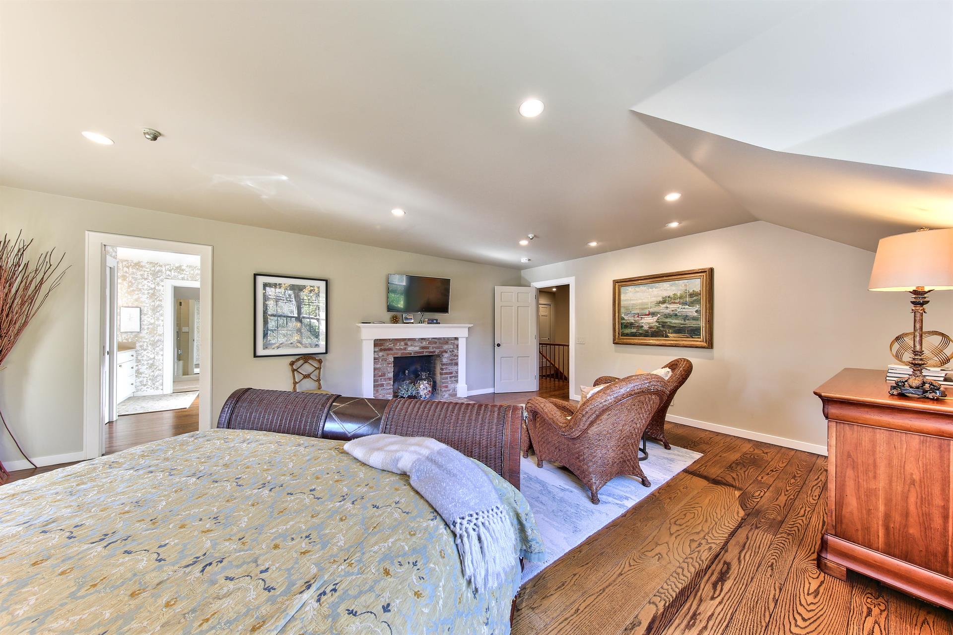 Bedroom 1  King Bed, Decorative Only fireplace
