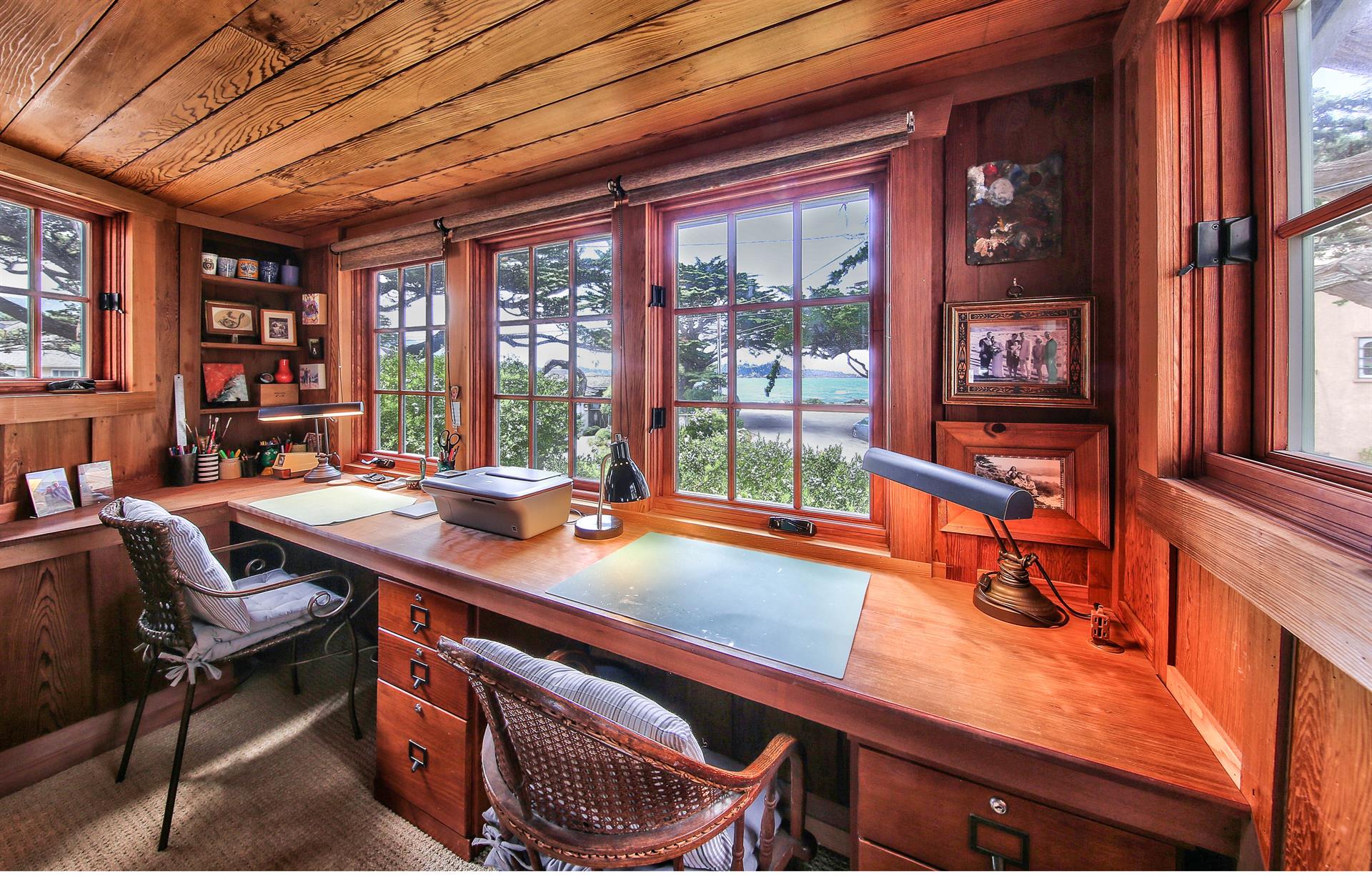 Bedroom 1 has a Large Builtin Desk Area with an Ocean View