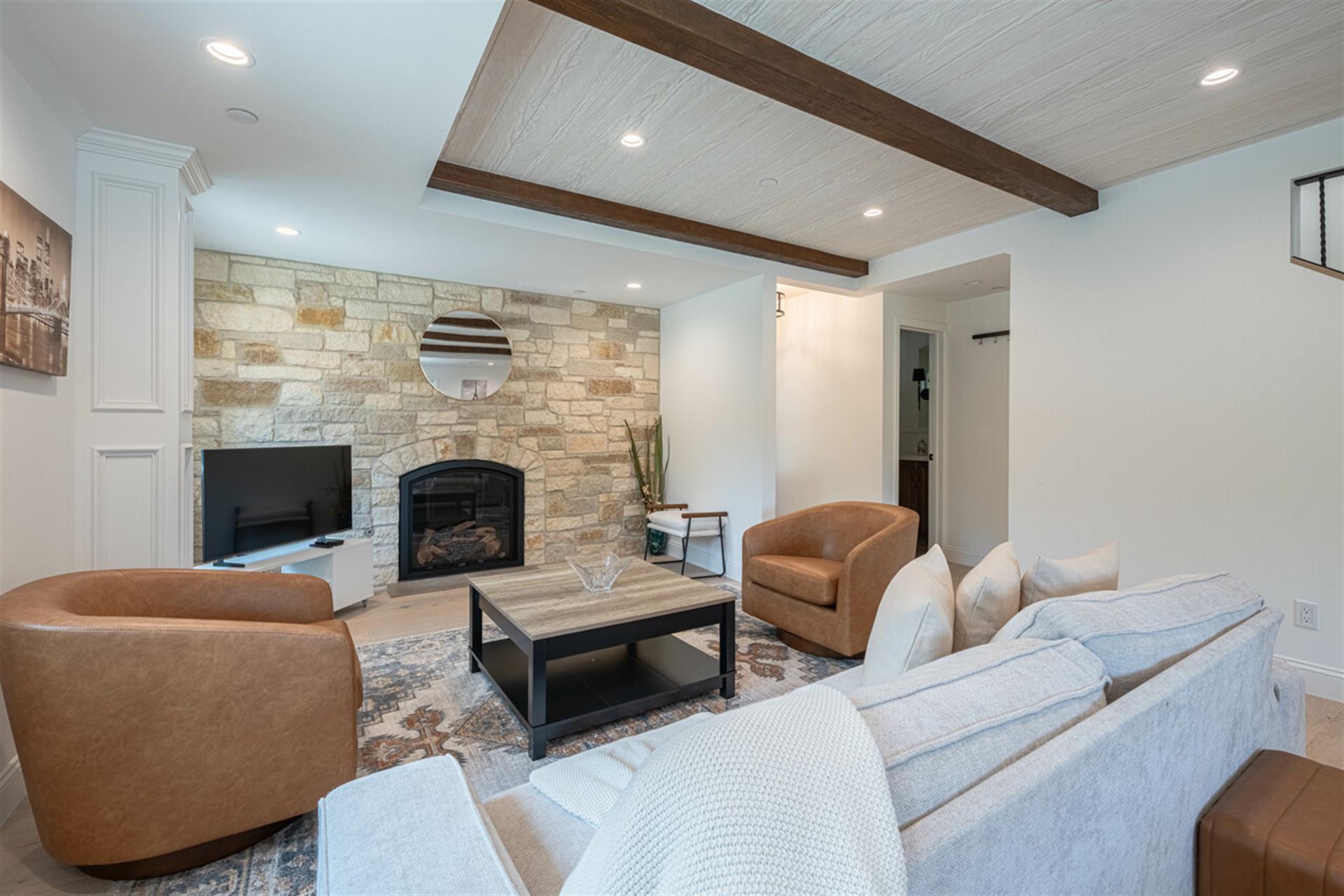 Living Room has a Gas Log Fireplace and a Smart TV
