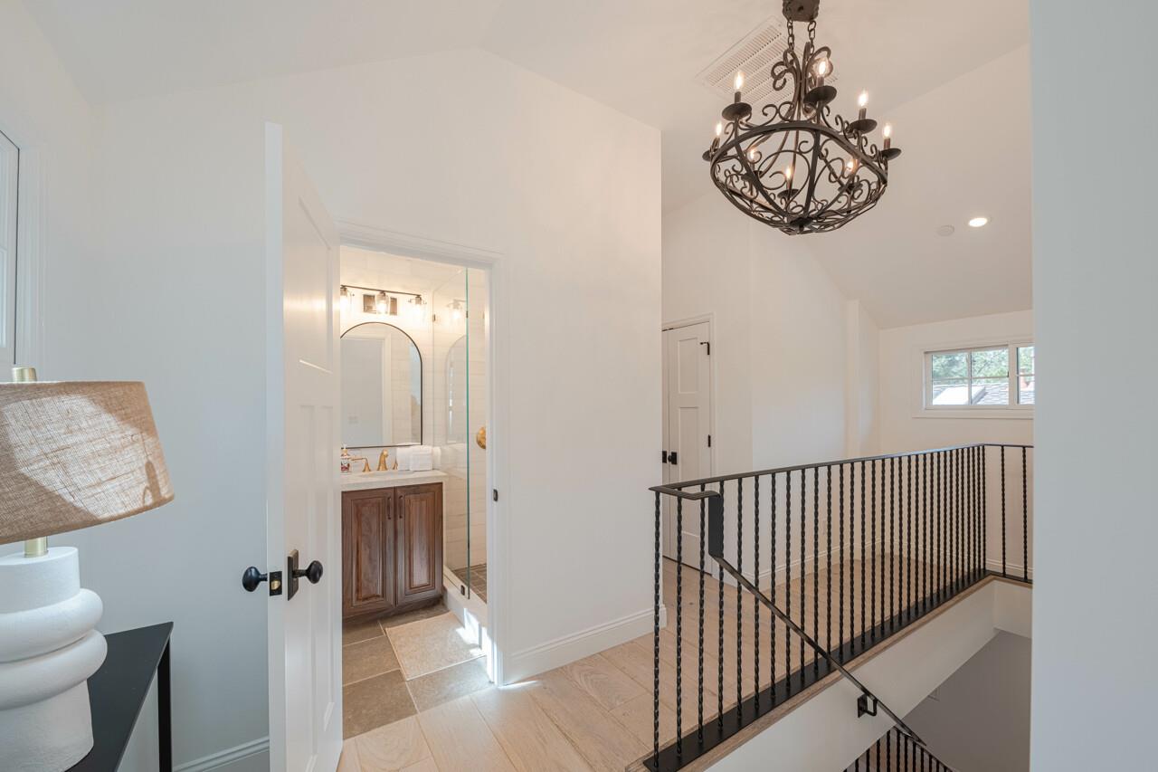 Upstairs there are Three Guest Bedrooms and a Full Hall Bath