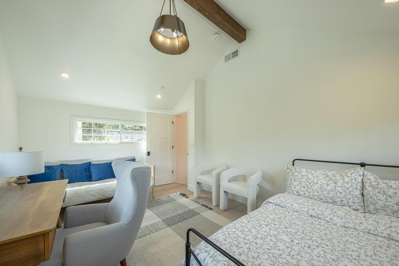 Bedroom 4 has a Queen Bed and a Twin Bed plus a Desk