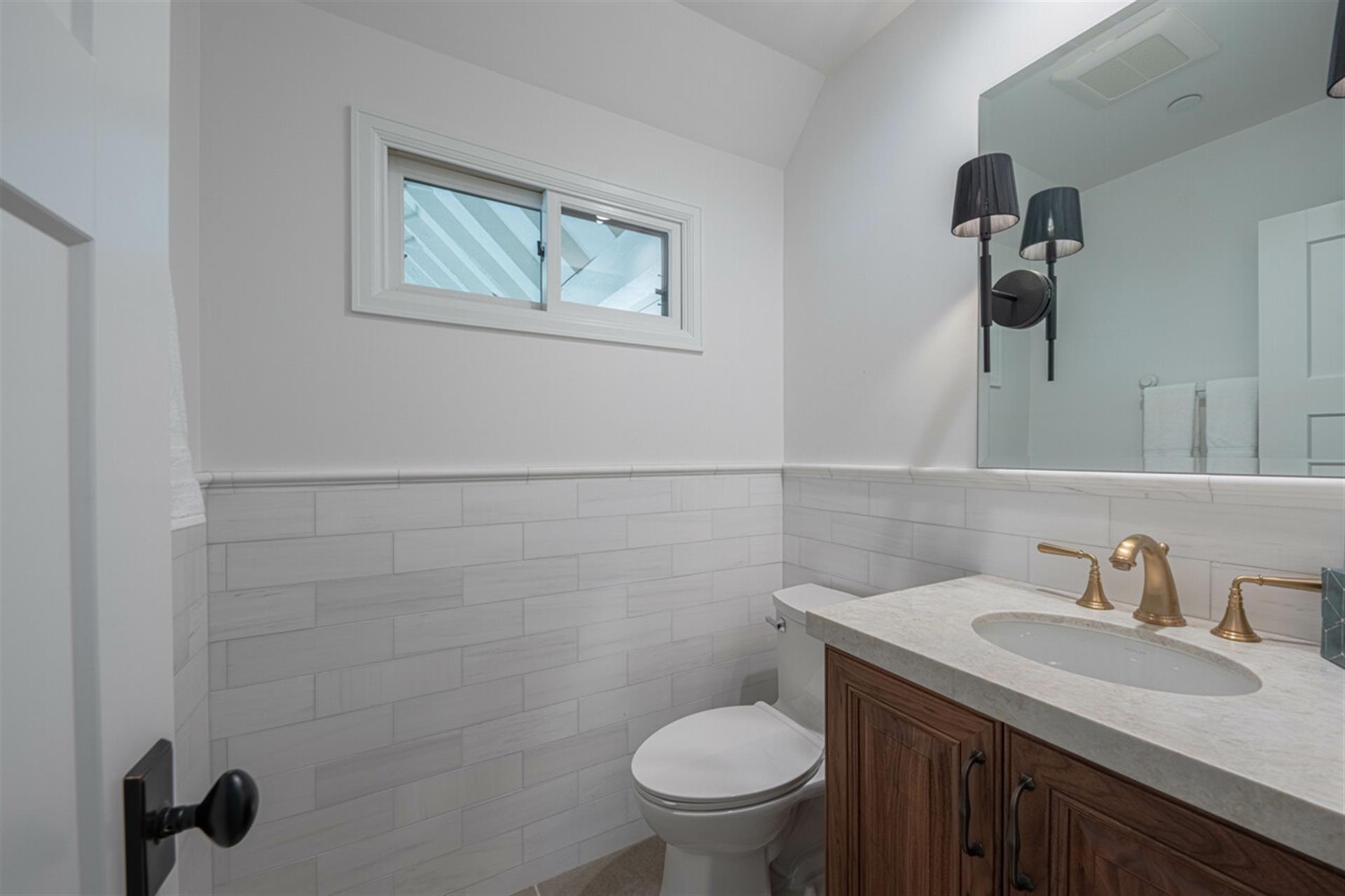 Downstairs Half Bath near the Living and Dining Room Area