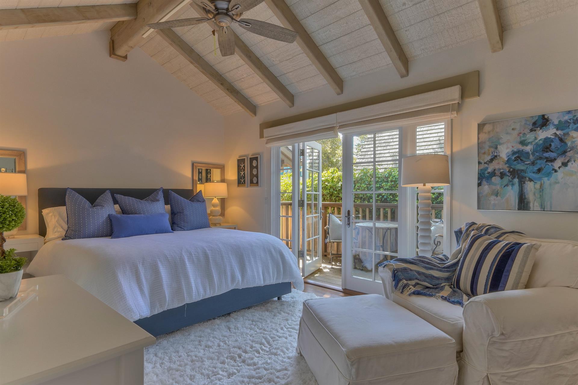 Bedroom 2 has Access to Side Deck through French Doors