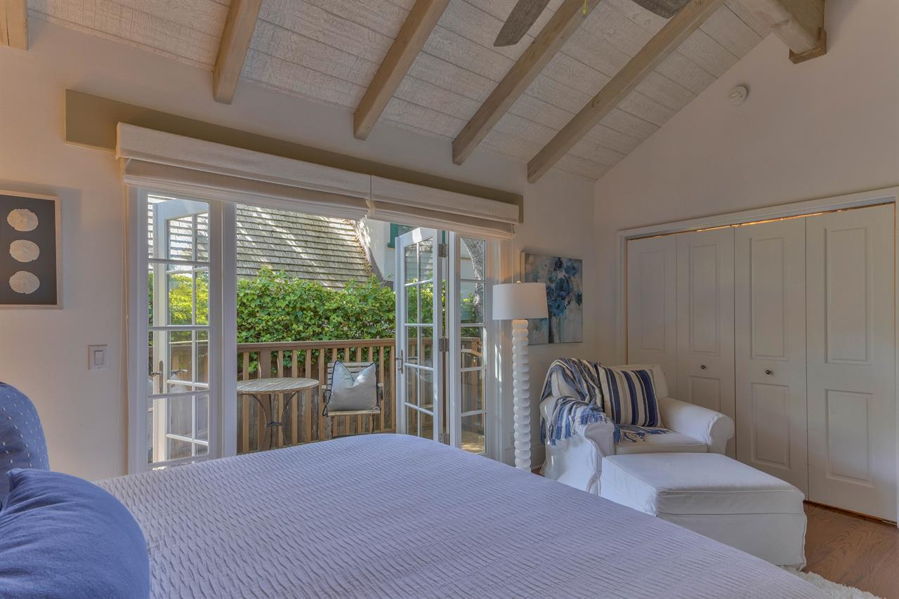 Bedroom 2 has Access to Side Deck through French Doors