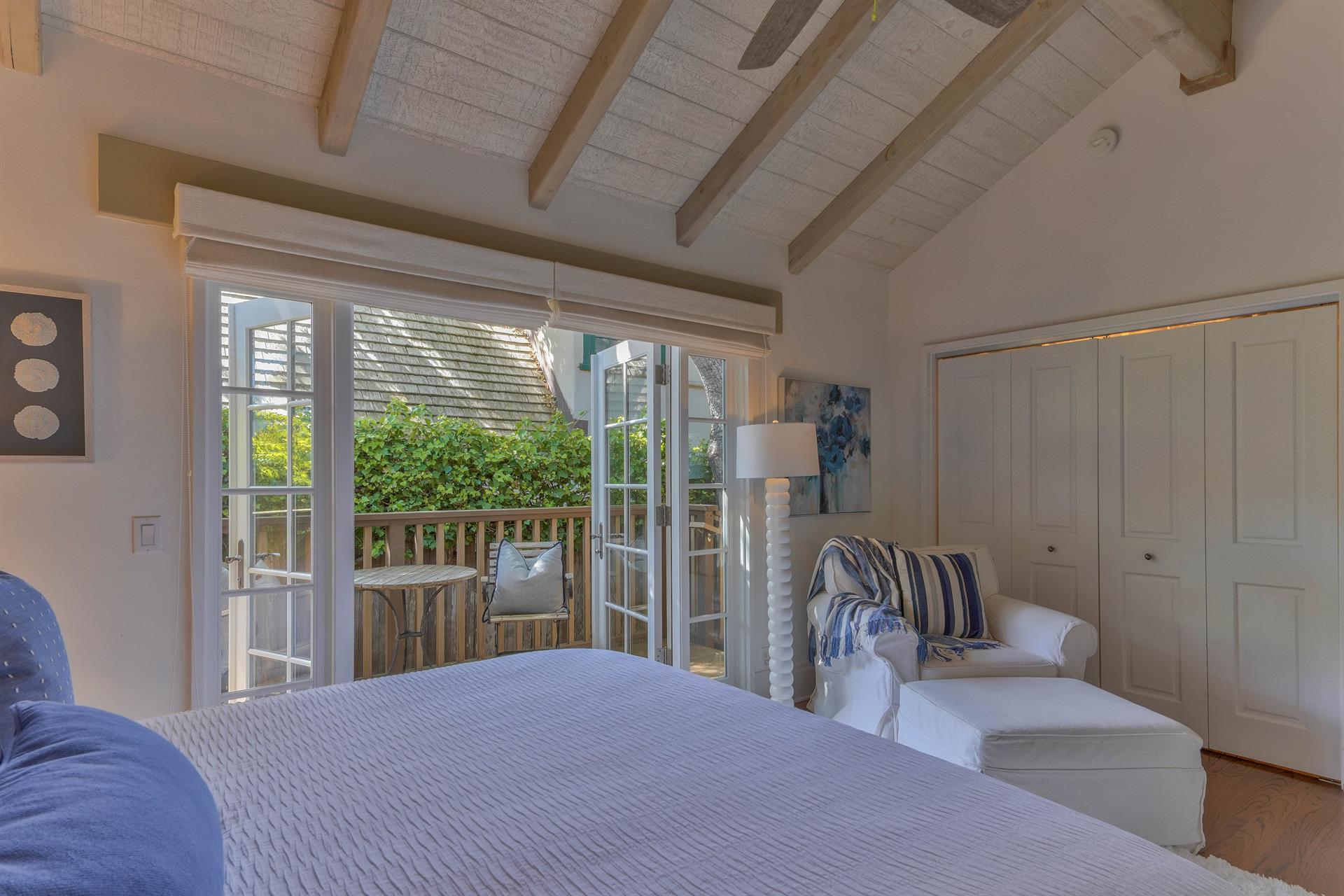 Bedroom 2 has Access to Side Deck through French Doors