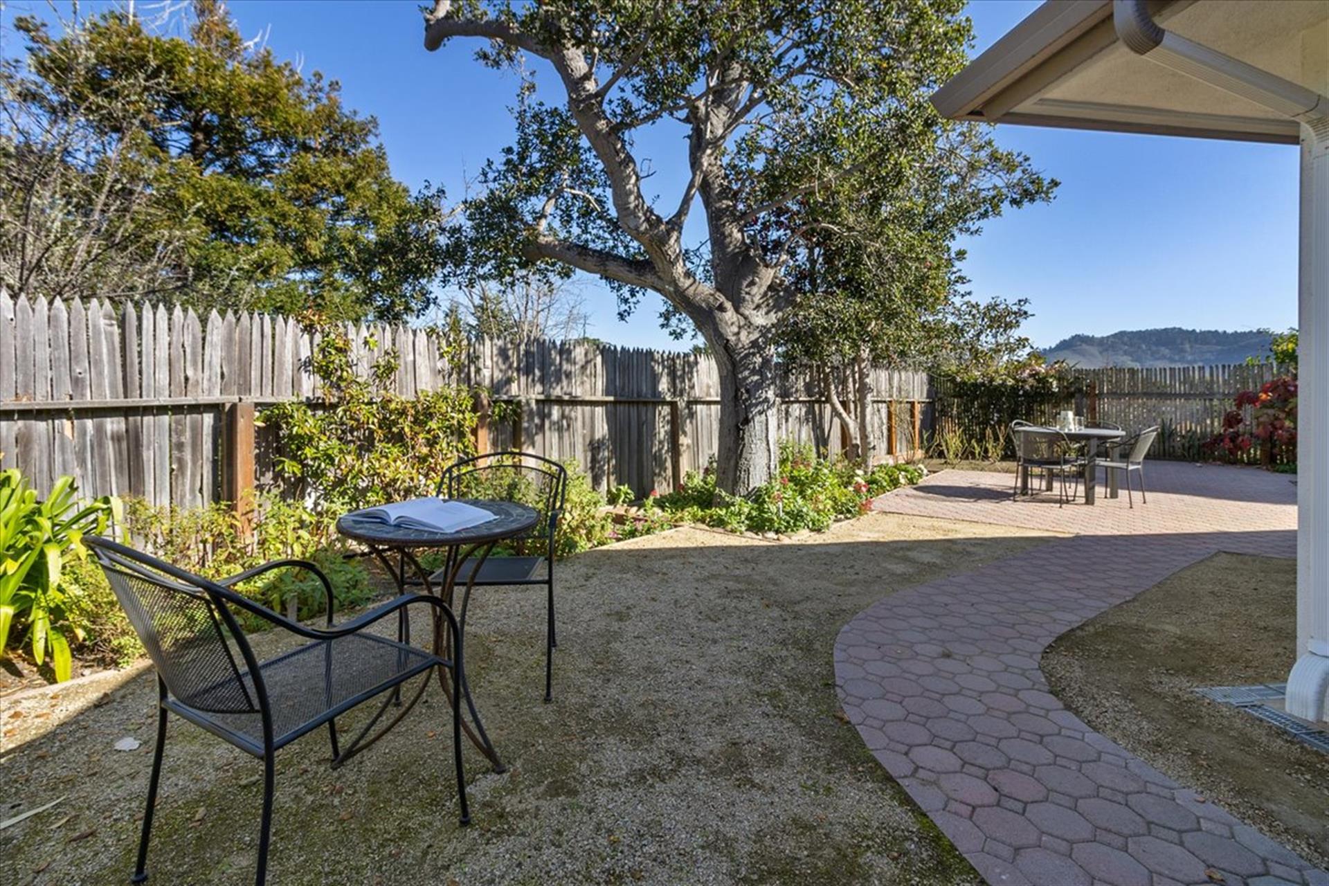 Backyard has Dining for Four and a Table for Two