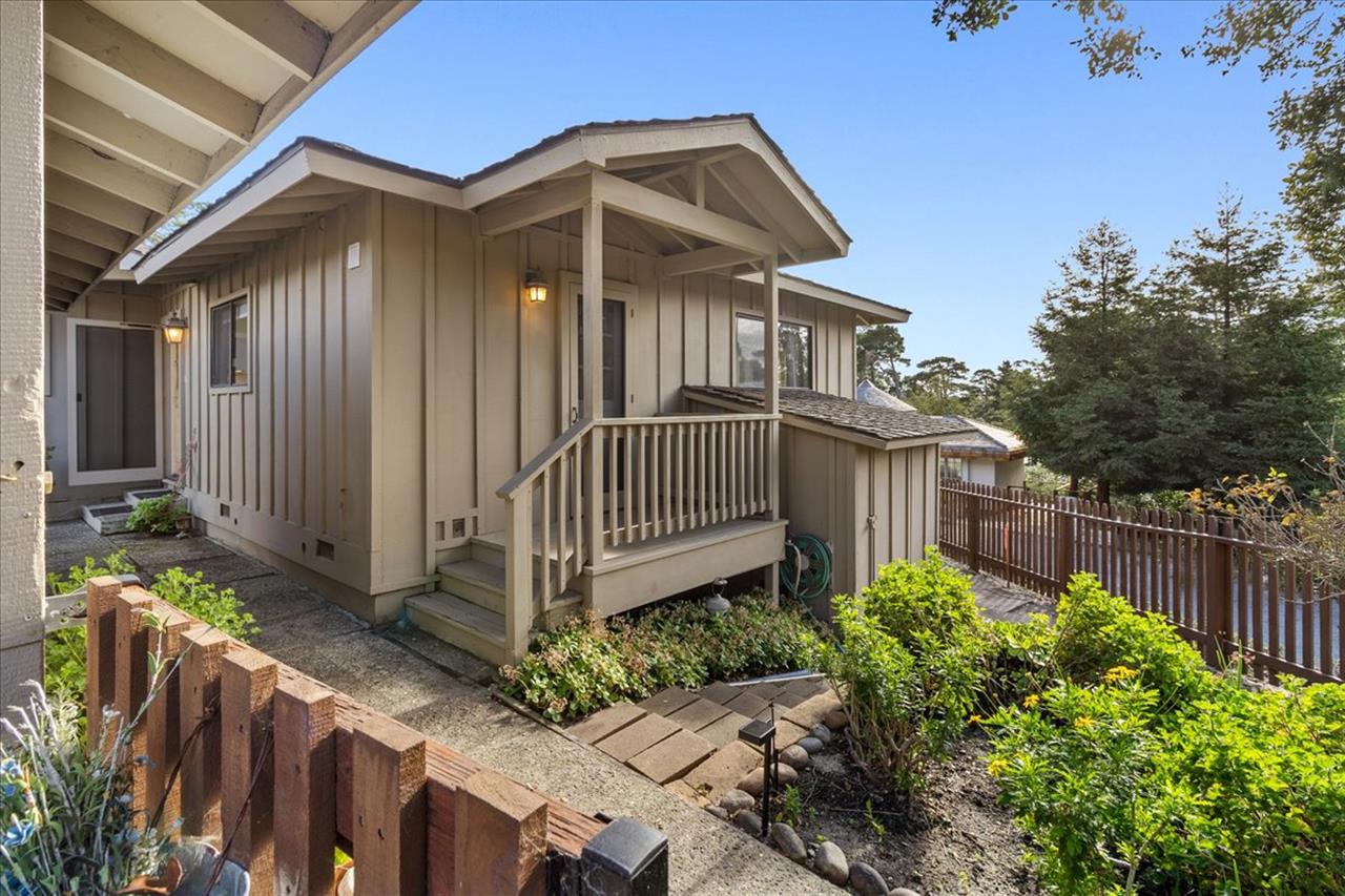 Front of the Home has Gardens and a Seating Area