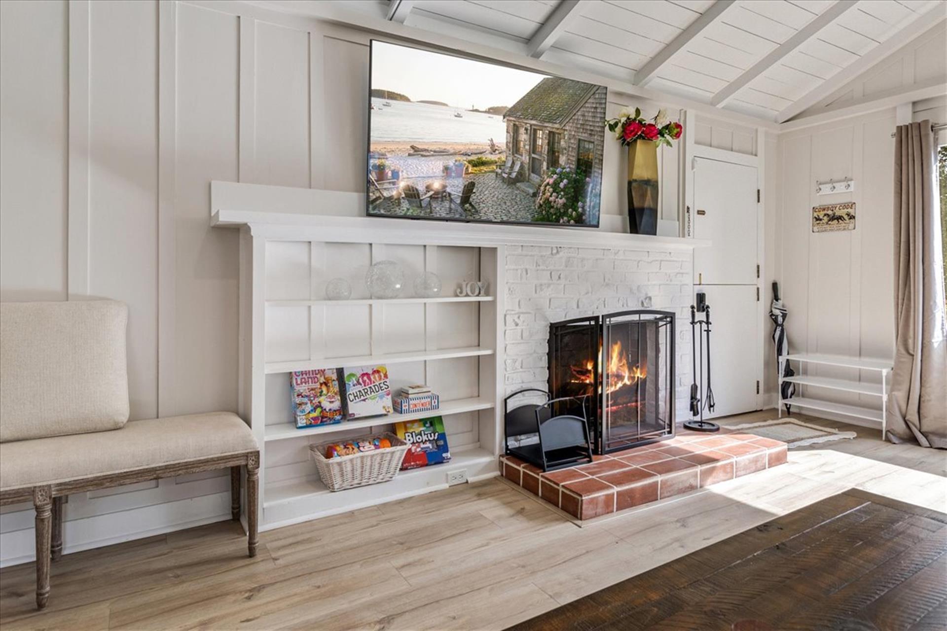 Living Room has a WoodBurning Fireplace and Smart TV