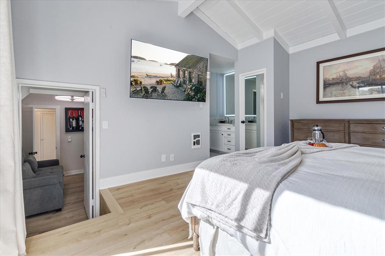 Bedroom 1 has a King Bed and a Smart TV