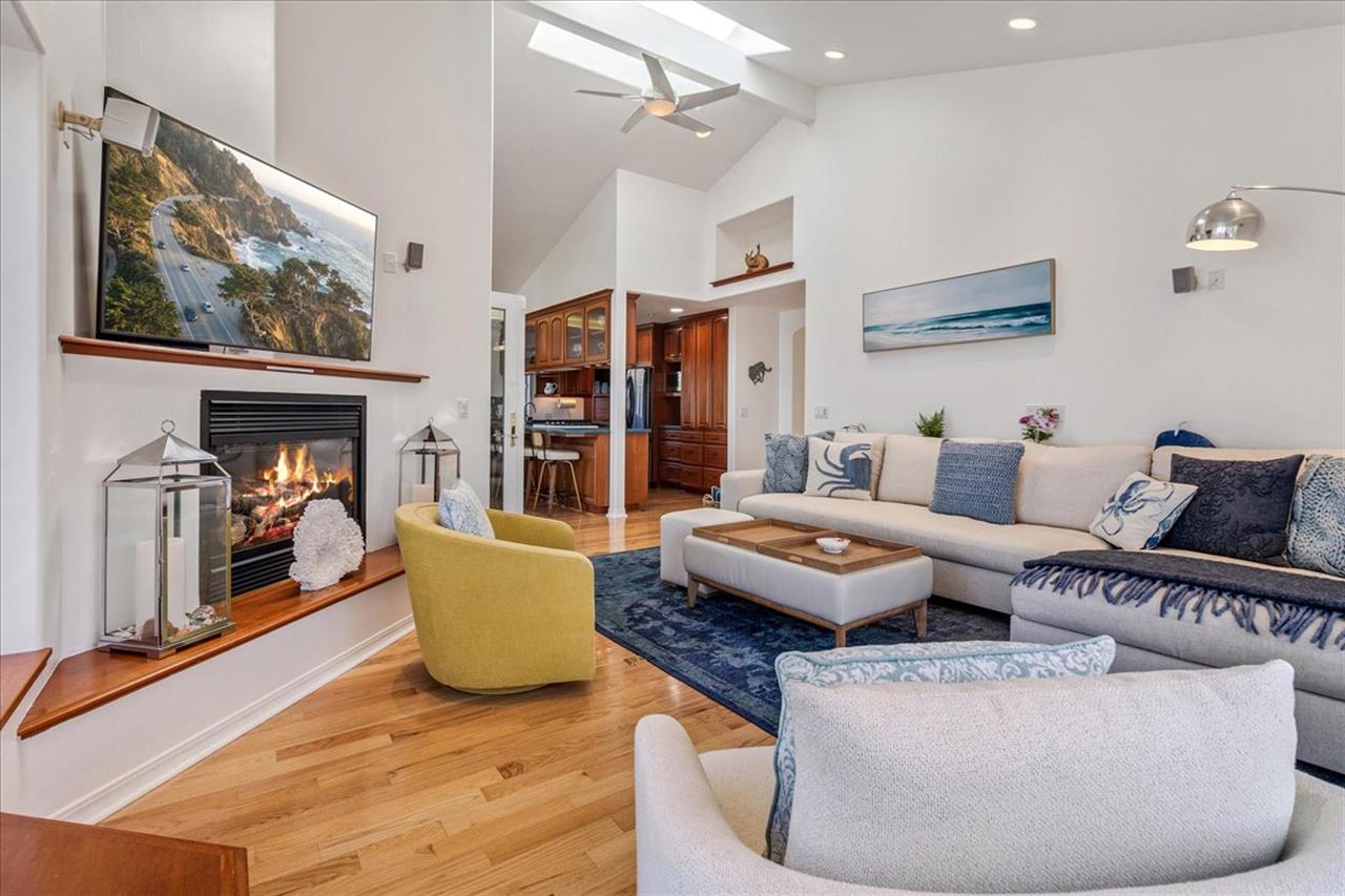 Living Room has a Gas Fireplace and Large Smart TV