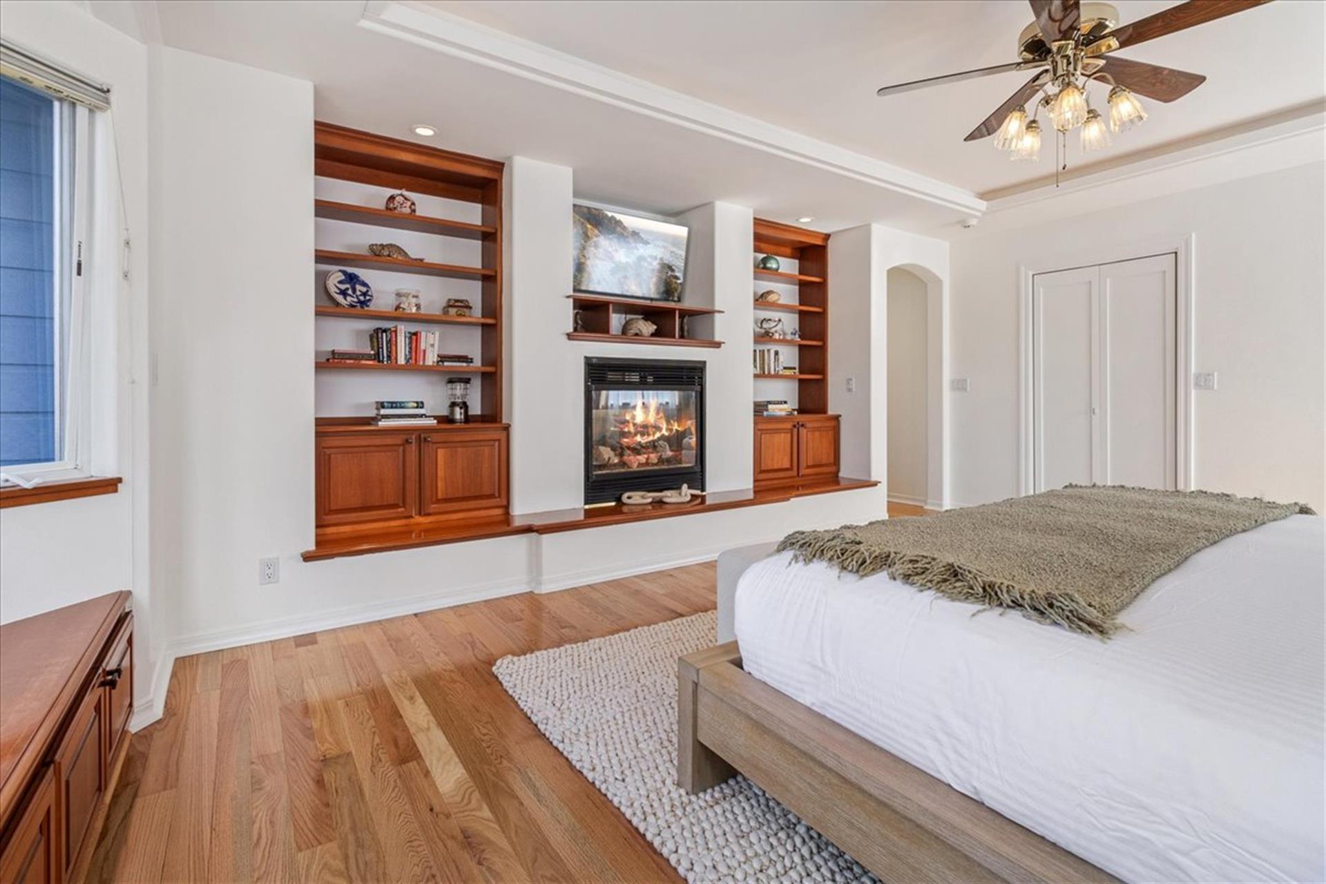 Relax in Cozy Bedroom 1 with Books, Fire Place, and Smart TV