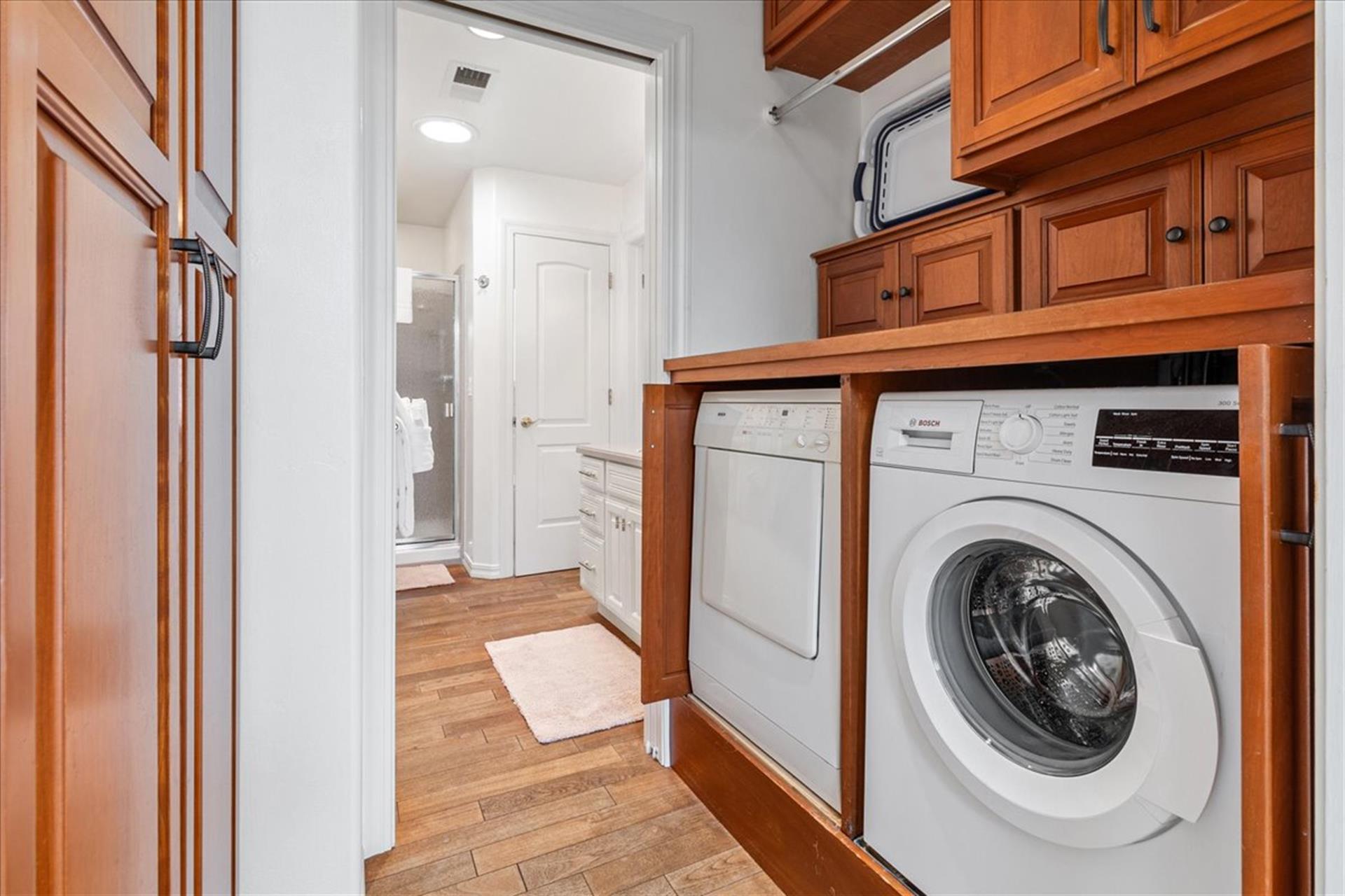 One of Two Laundry Areas