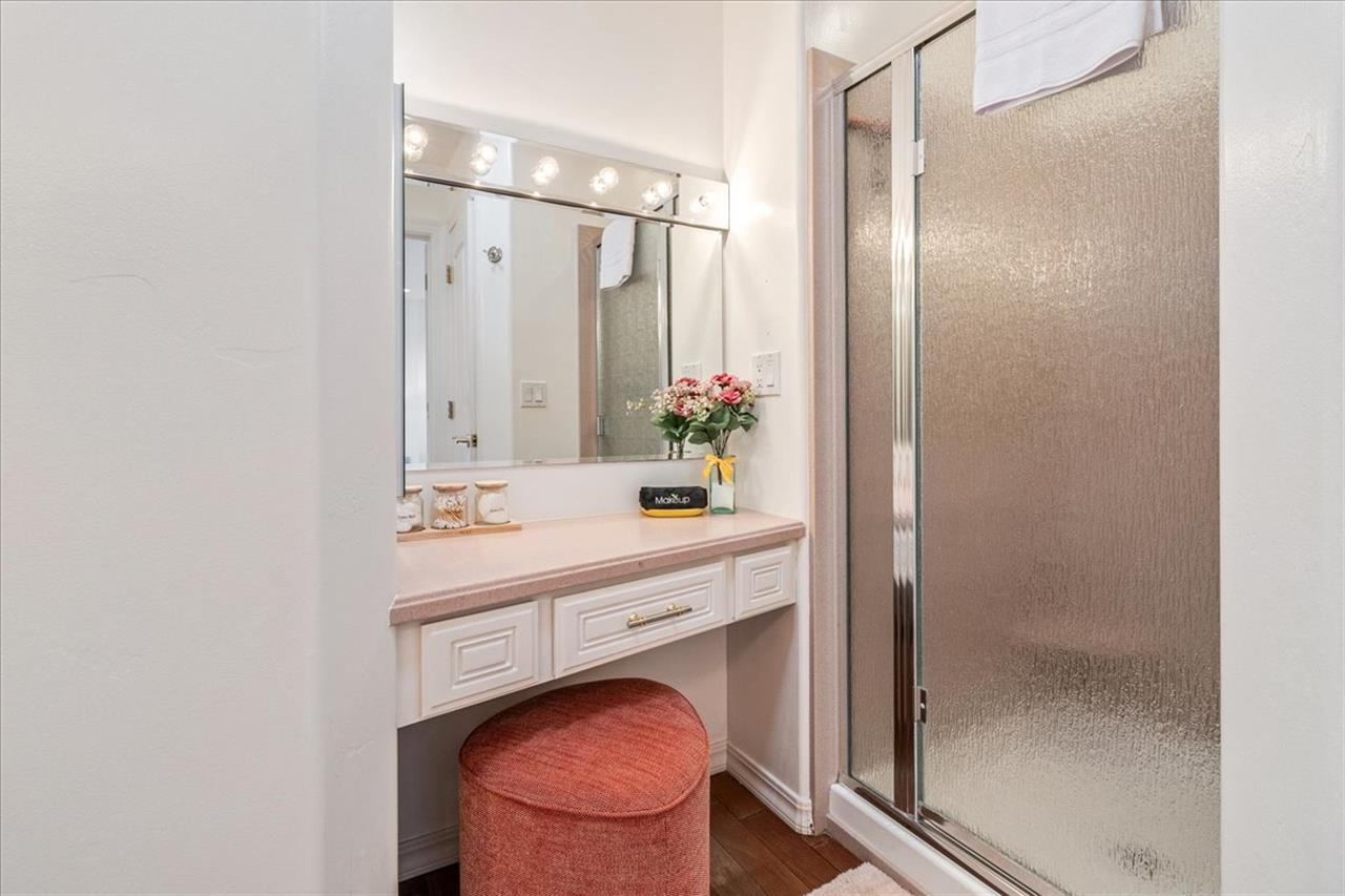 Bathroom 2 has a Shower and a Vanity Console