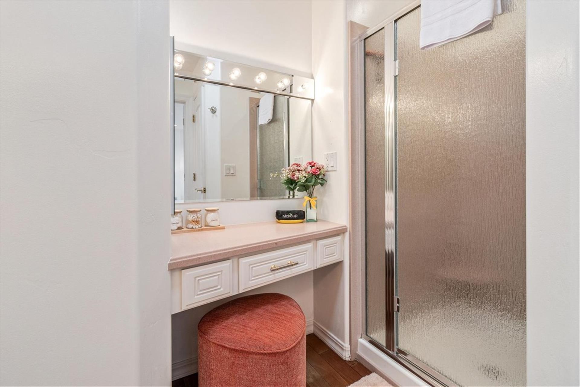 Bathroom 2 has a Shower and a Vanity Console