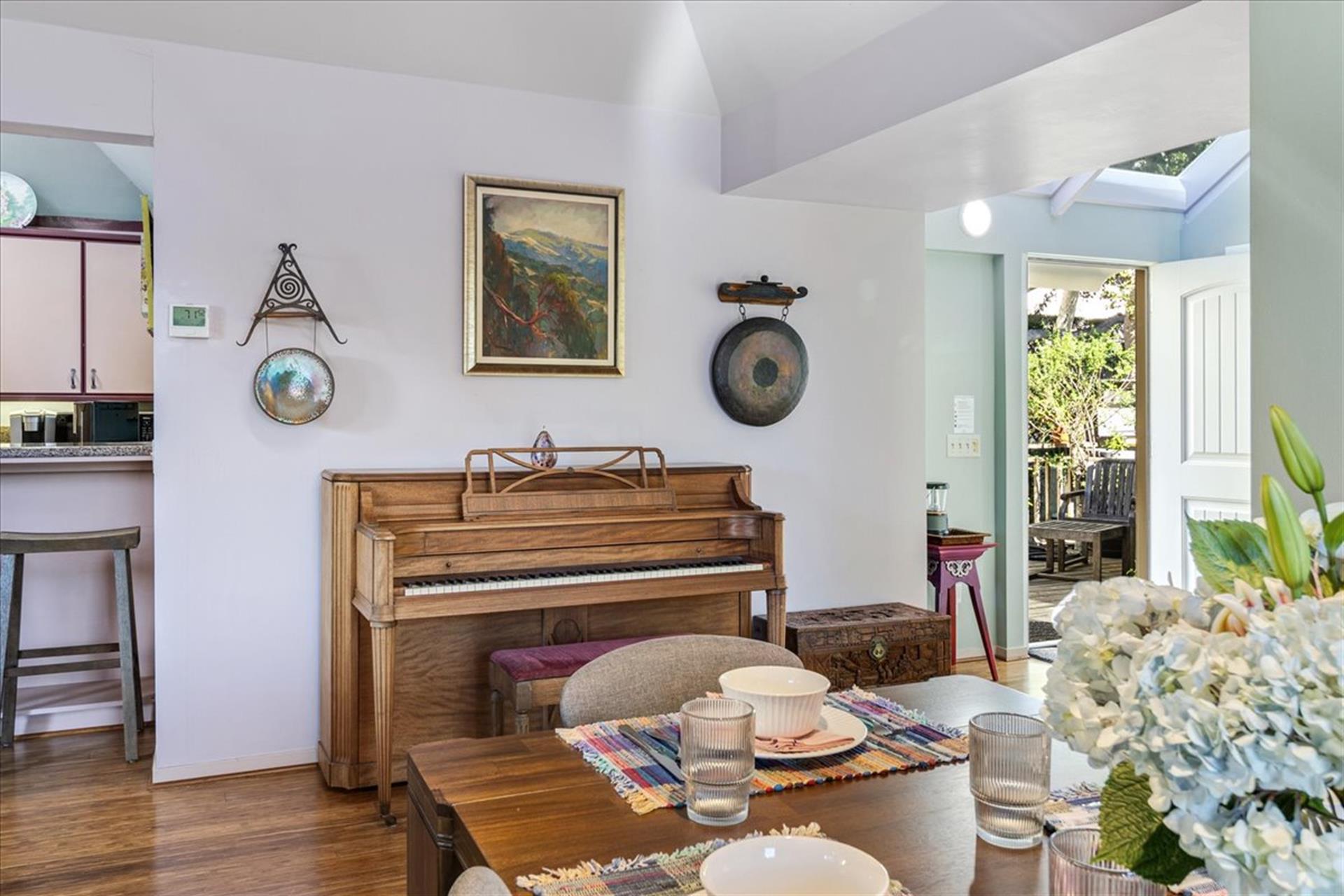 The Home has a Piano in the Living Room  Dining Area