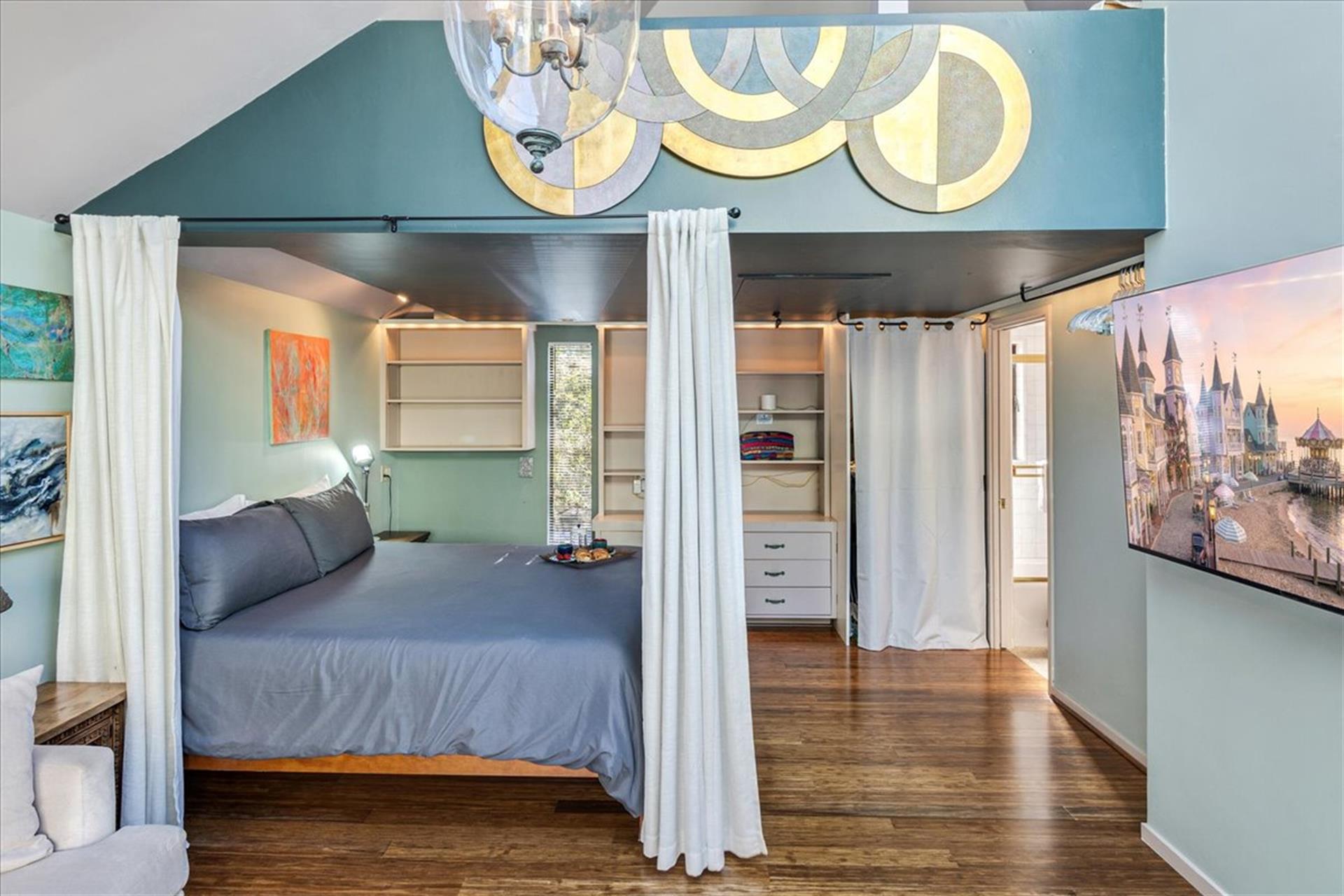 Bedroom 2 has a King Bed, TV and an EnSuite Bathroom