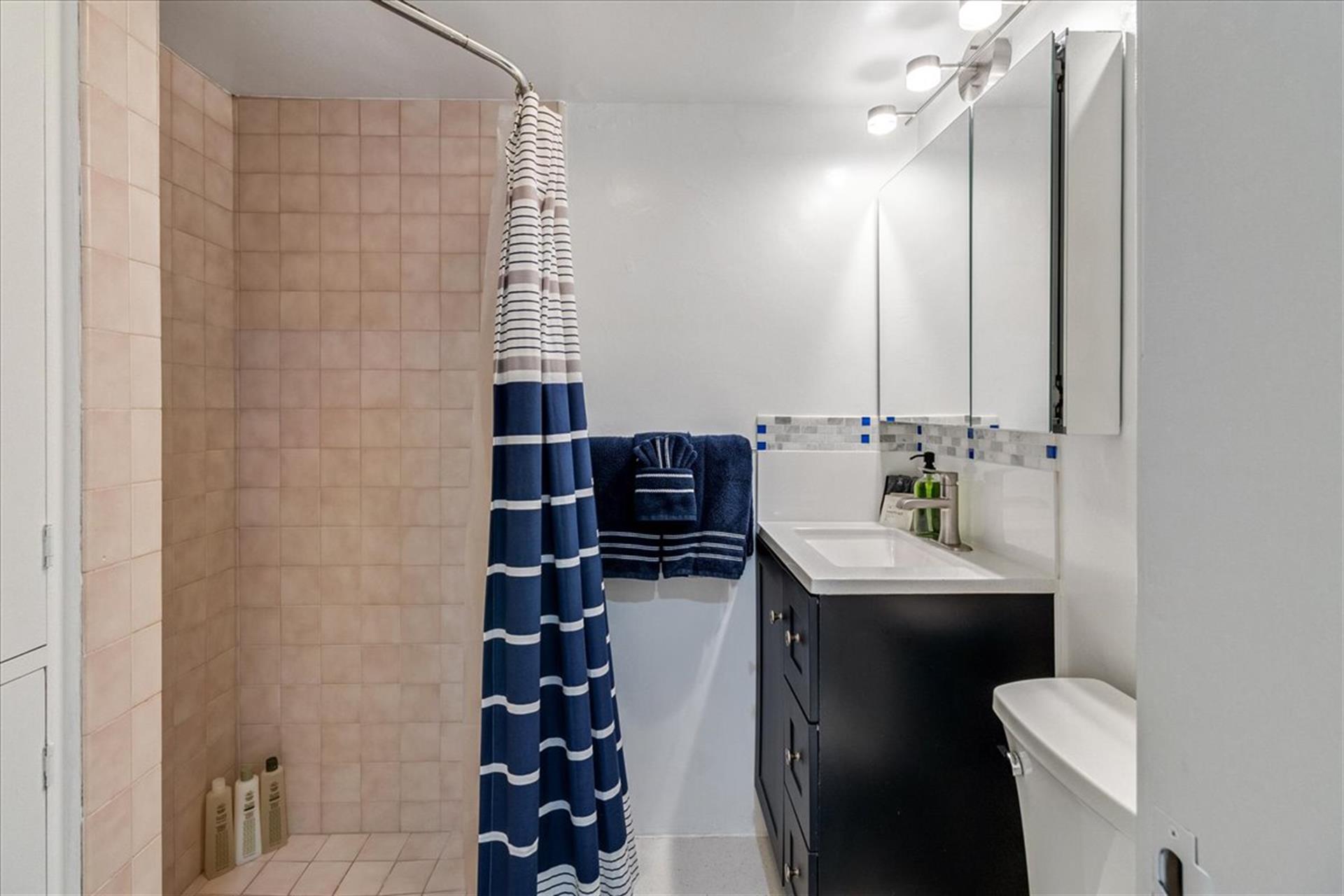 Studio has a Full Bathroom with a Shower