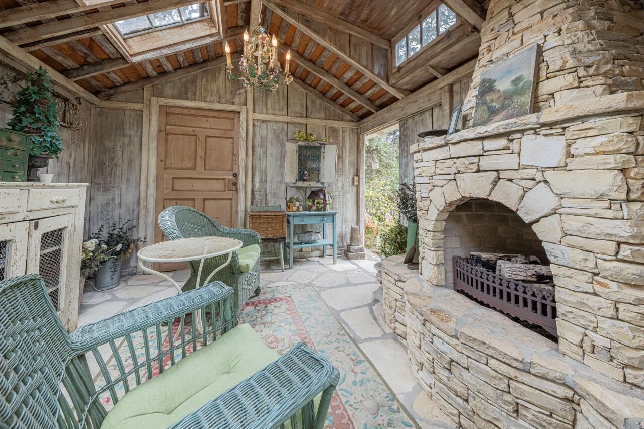 Garden Room has a GasLog Fireplace and Two Reading Chairs