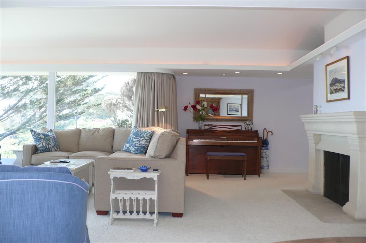 Living Room with the Fireplace and Piano