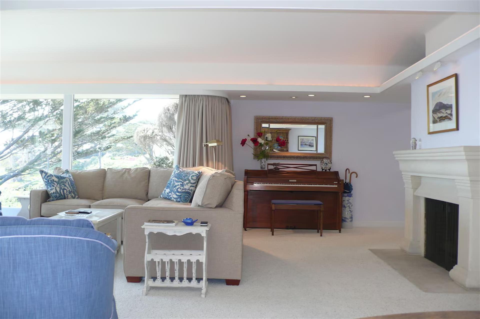 Living Room with the Fireplace and Piano