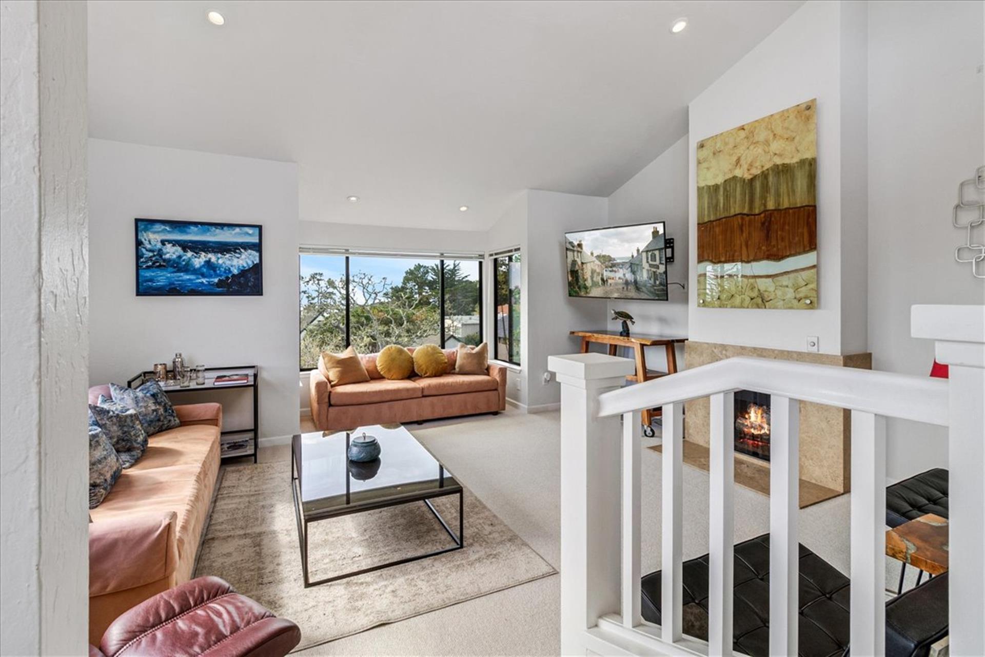 Living Room with Steps Leading to the Dining Area and Kitchen