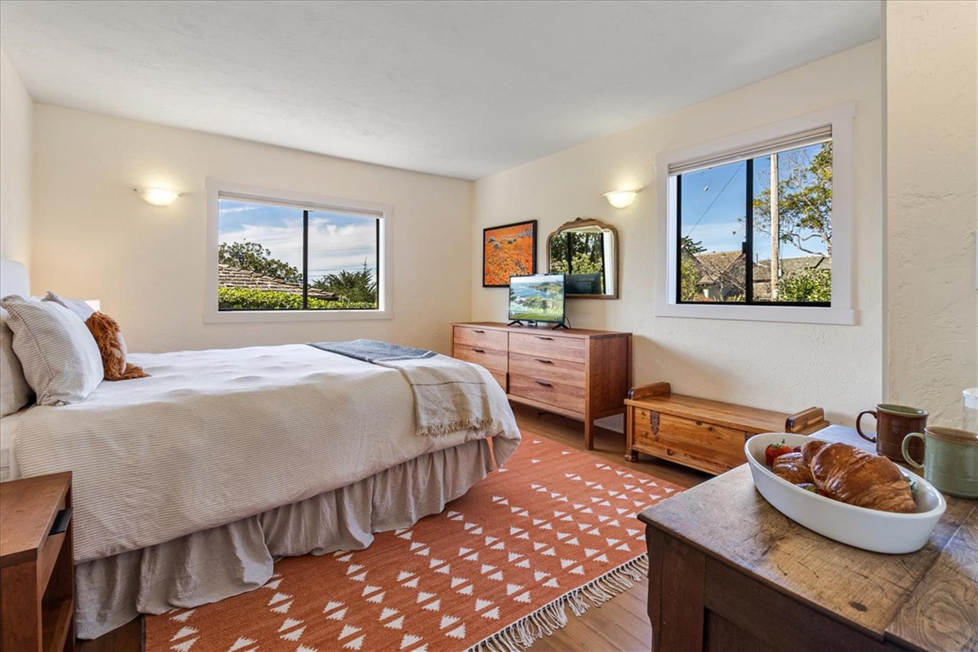 Bedroom 1 has a King Bed and a TV