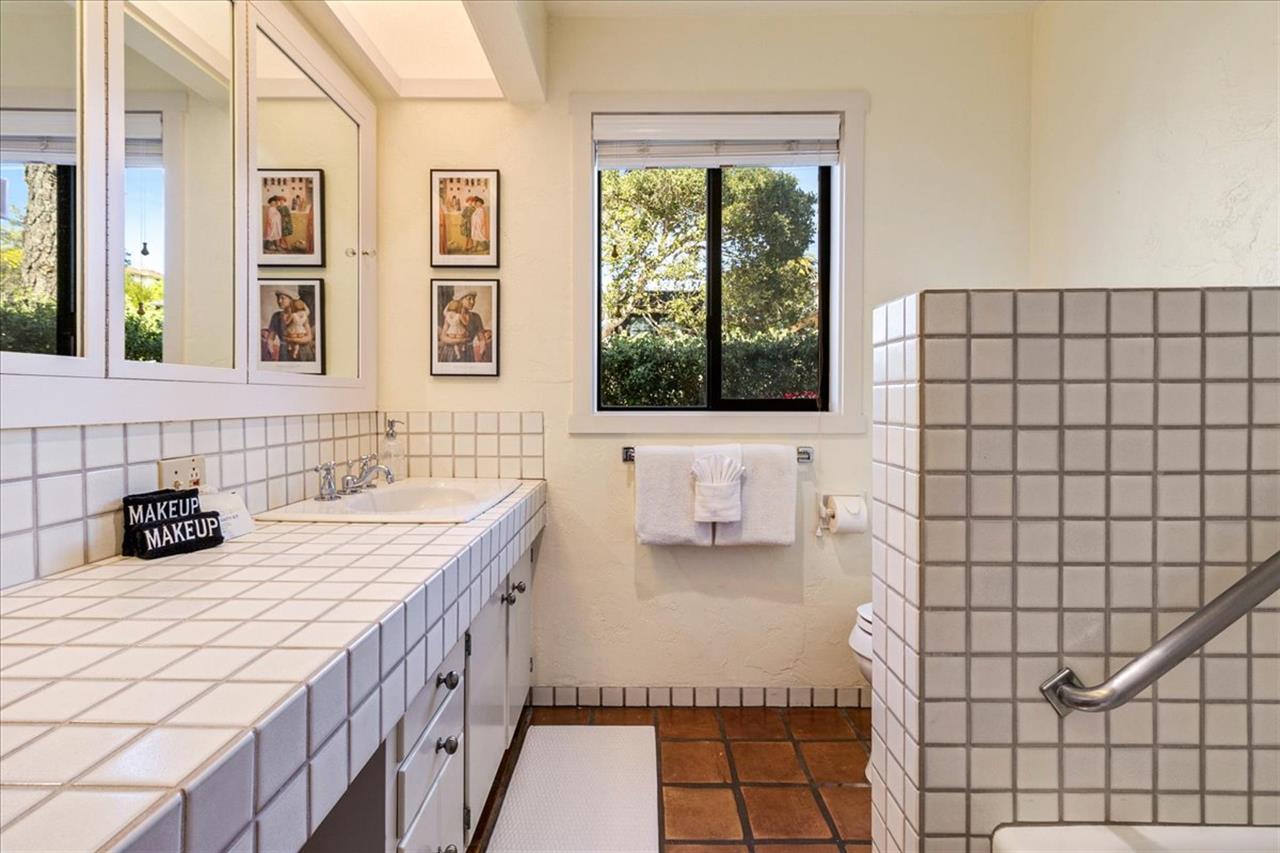 Downstairs Bathroom  Shower Over Tub, Next to Bedroom 1