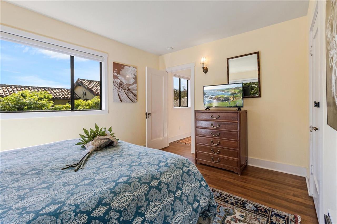 Bedroom 2 has a Queen Bed and TV