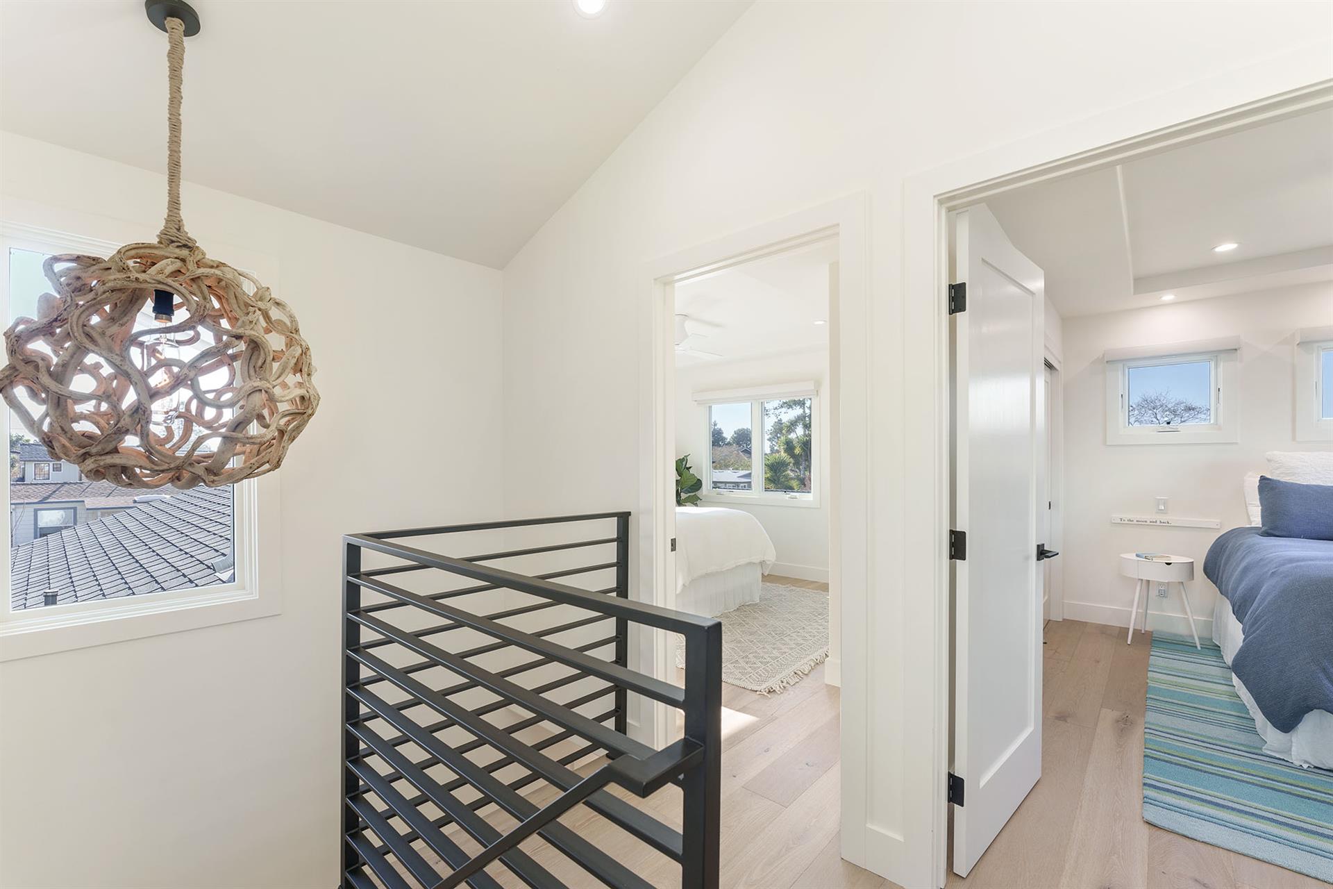 Heading Upstairs  Bedrooms 2 and 3 have Queen Beds