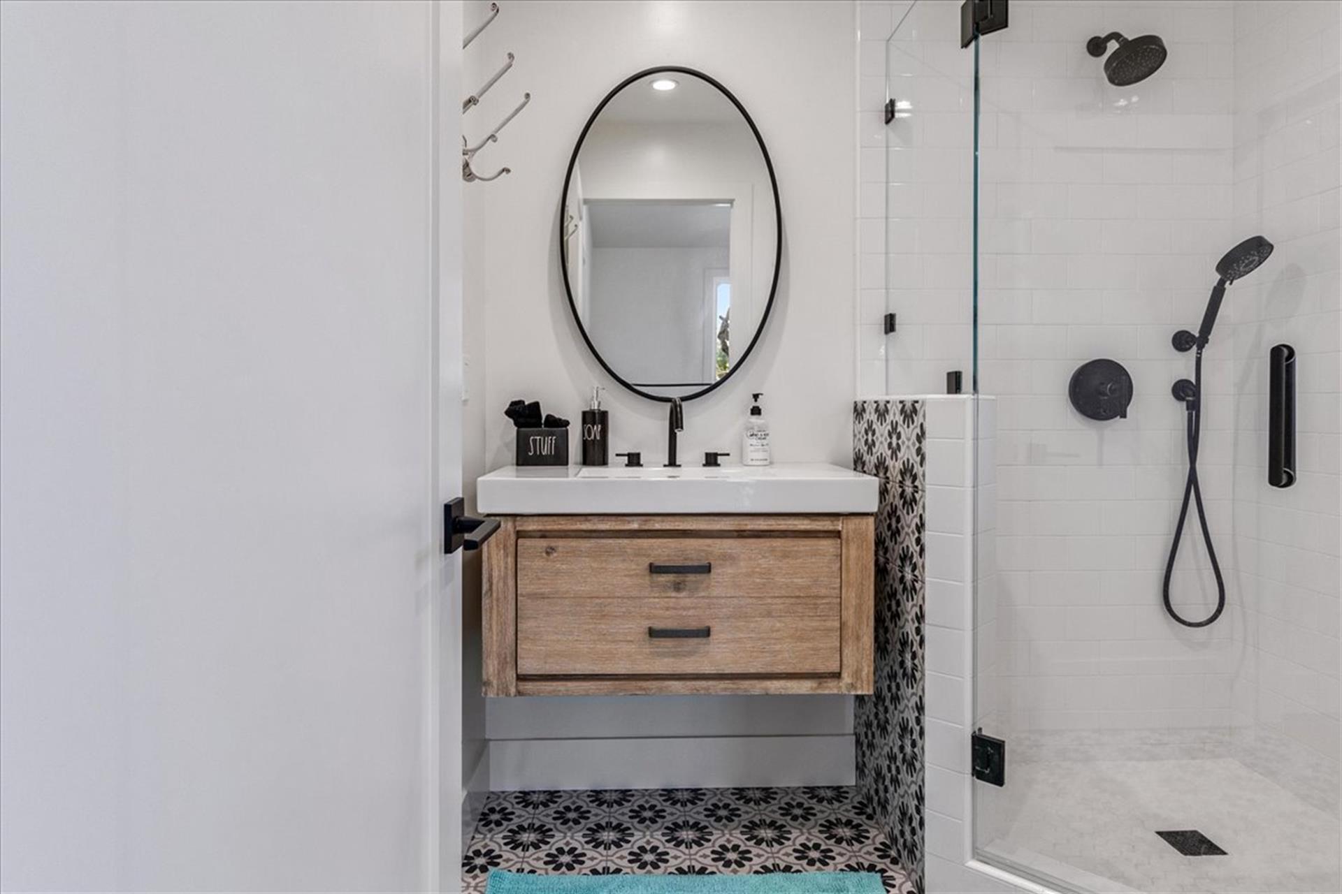 Hall Bathroom  Upstairs and has a Shower