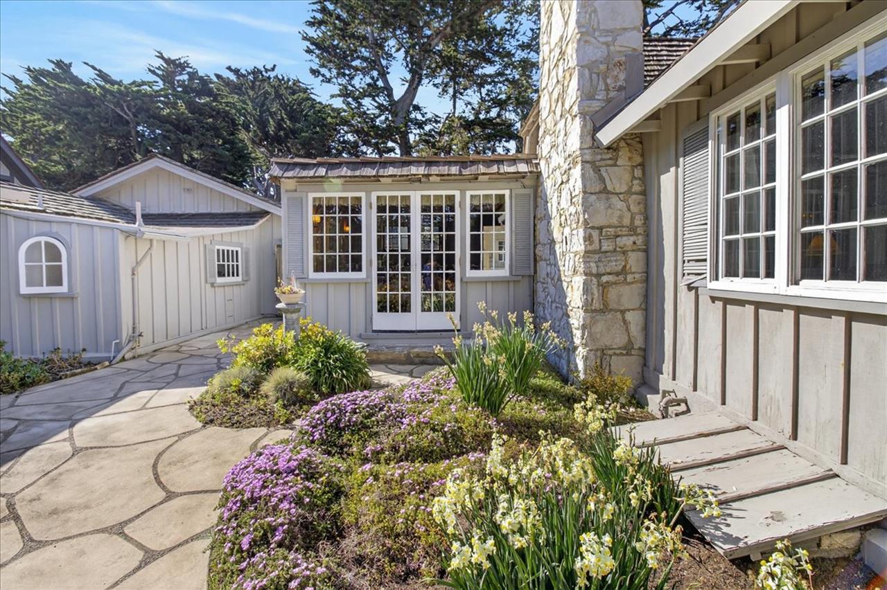 Attractive Landscaping and Patios Surround the Home