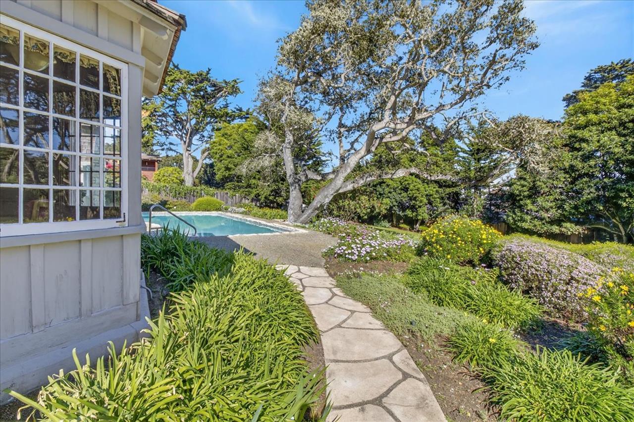 Attractive Landscaping and Patios Surround the Home