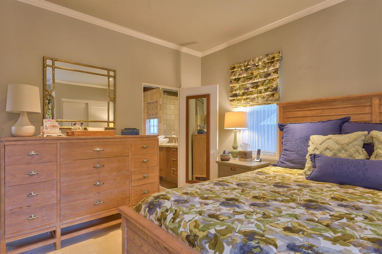 Bedroom 1  King Bed, EnSuite Bath with a Shower Over Tub