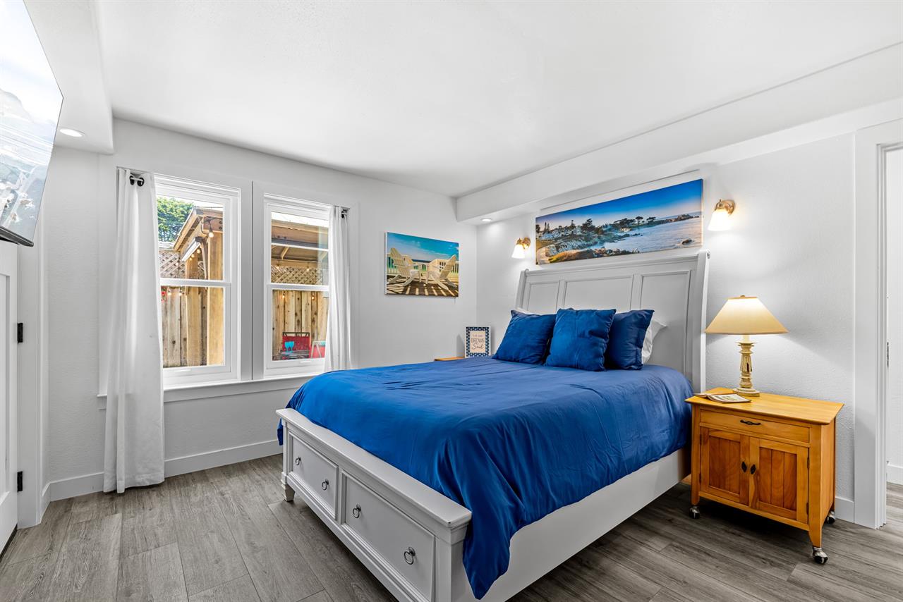 Bedroom 1, Queen Bed, TV, Patio Access, EnSuite Bathroom