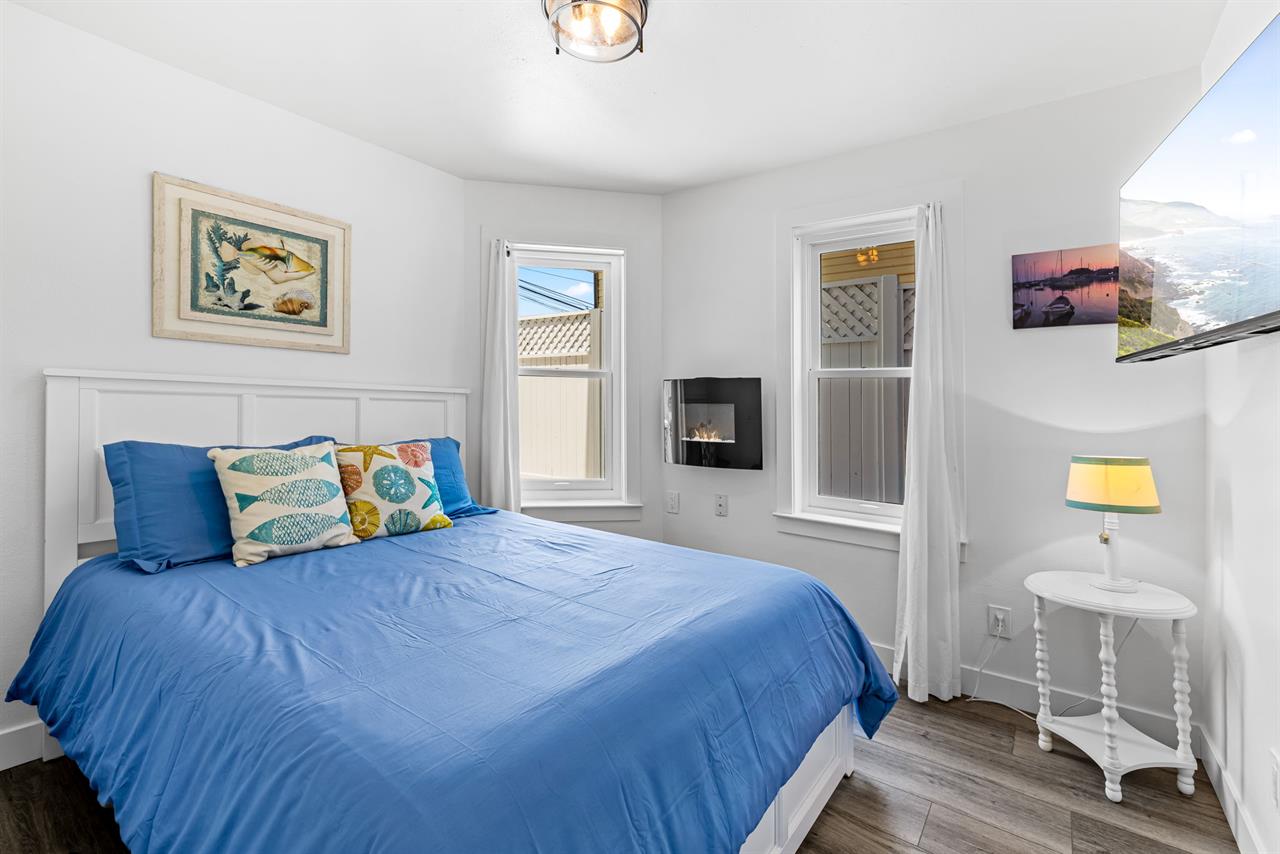 Bedroom 3  Queen Bed, Electric Fireplace and TV