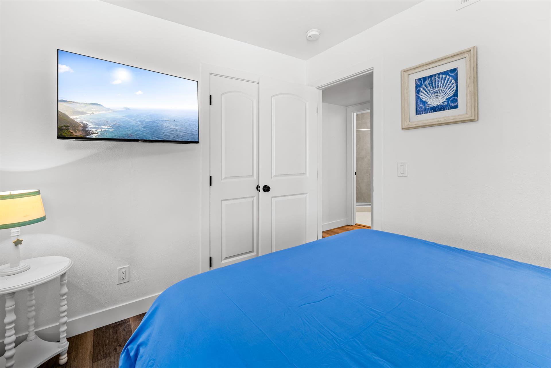 Bedroom 3  Queen Bed, Electric Fireplace and TV