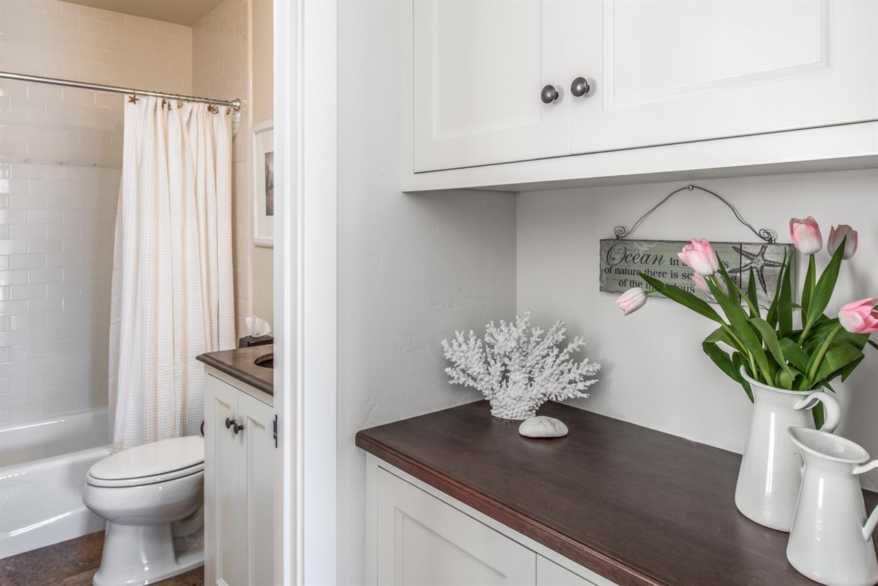 HallwayAccessed Bathroom with Shower Over Tub